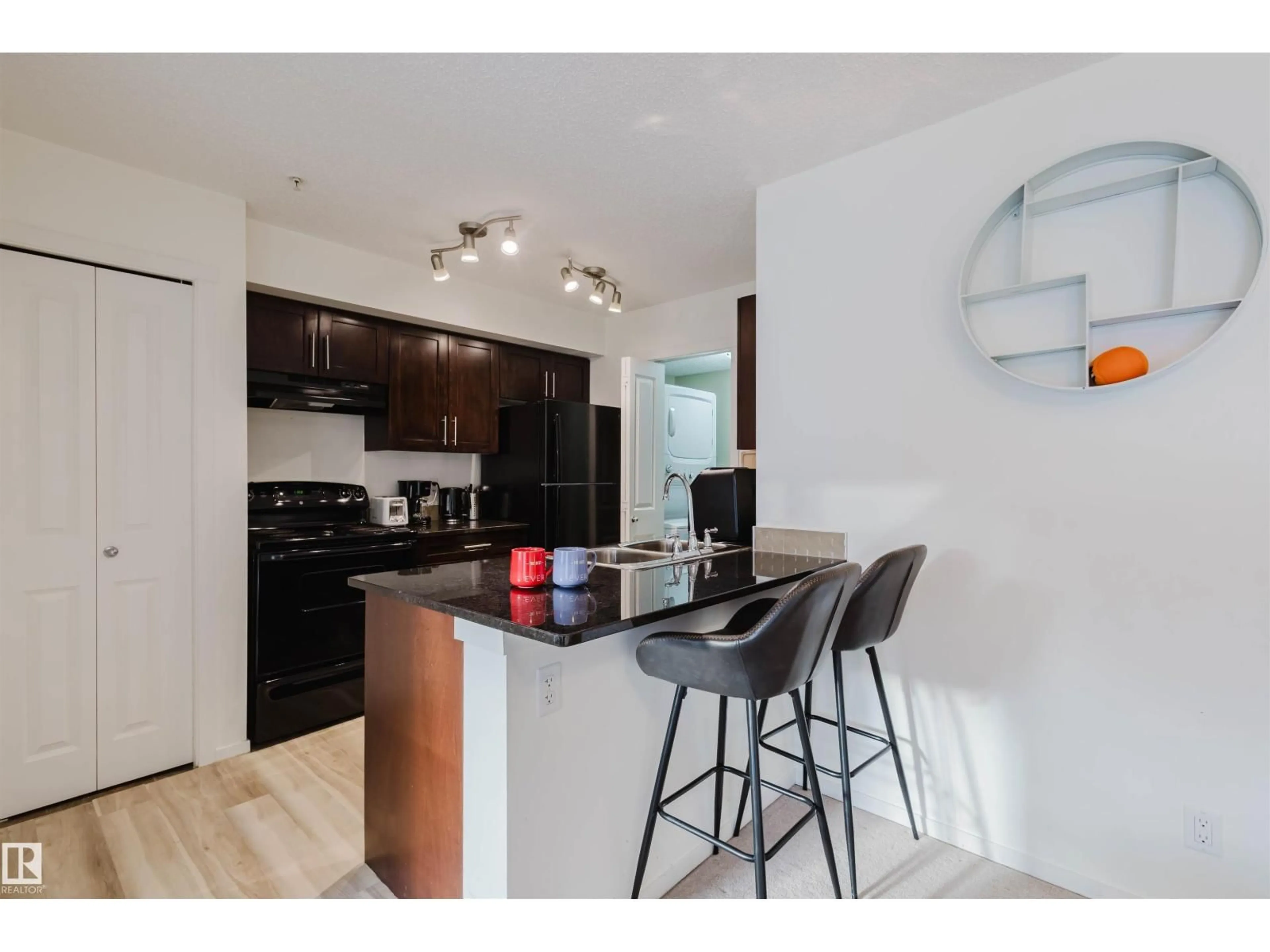 Open concept kitchen, unknown for #313 - 5816 MULLEN PL, Edmonton Alberta T6R0W3