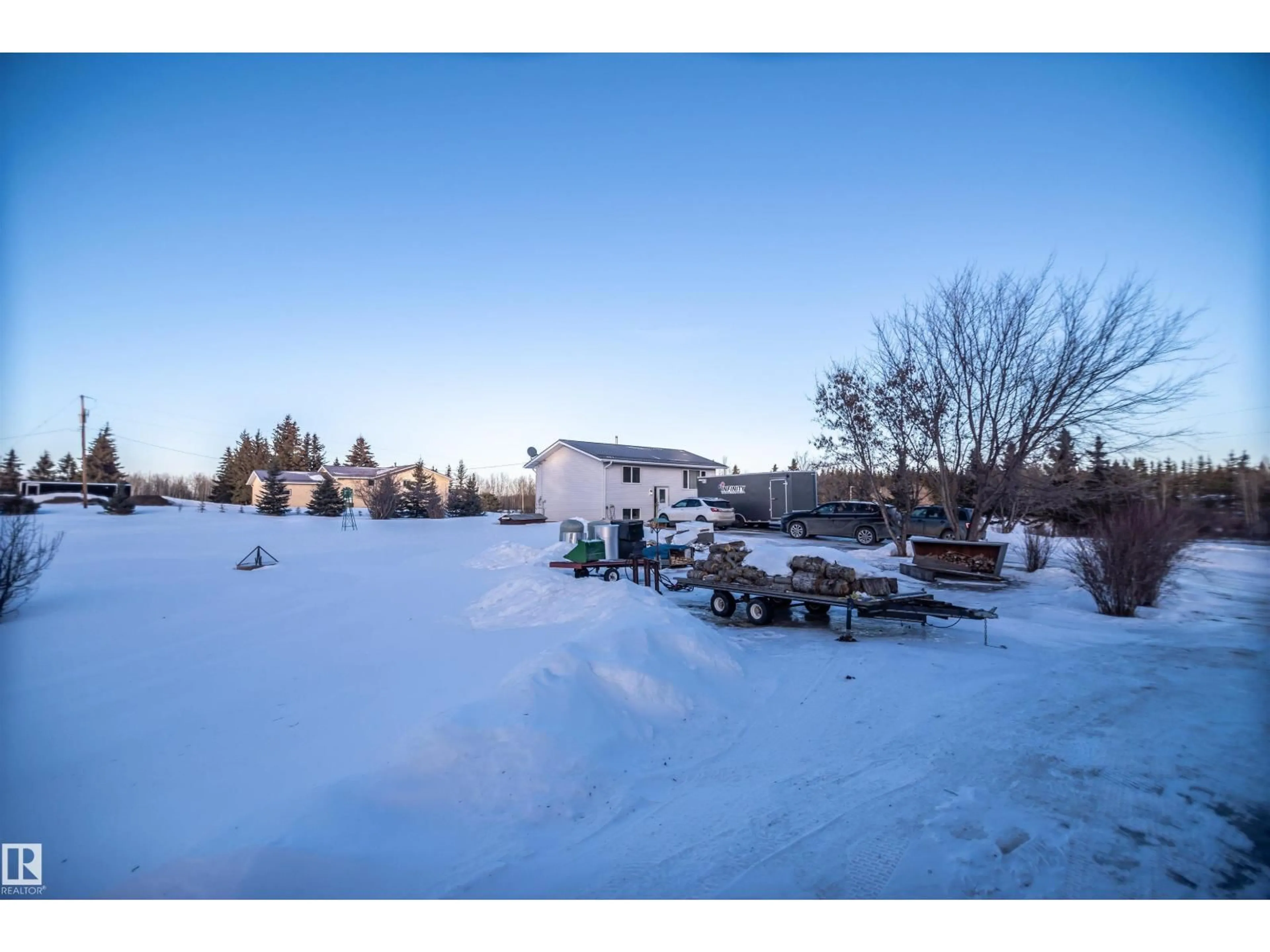 A pic from outside/outdoor area/front of a property/back of a property/a pic from drone, mountain view for #6 6 - 54126 RGE ROAD 30, Rural Lac Ste. Anne County Alberta T0E0A0