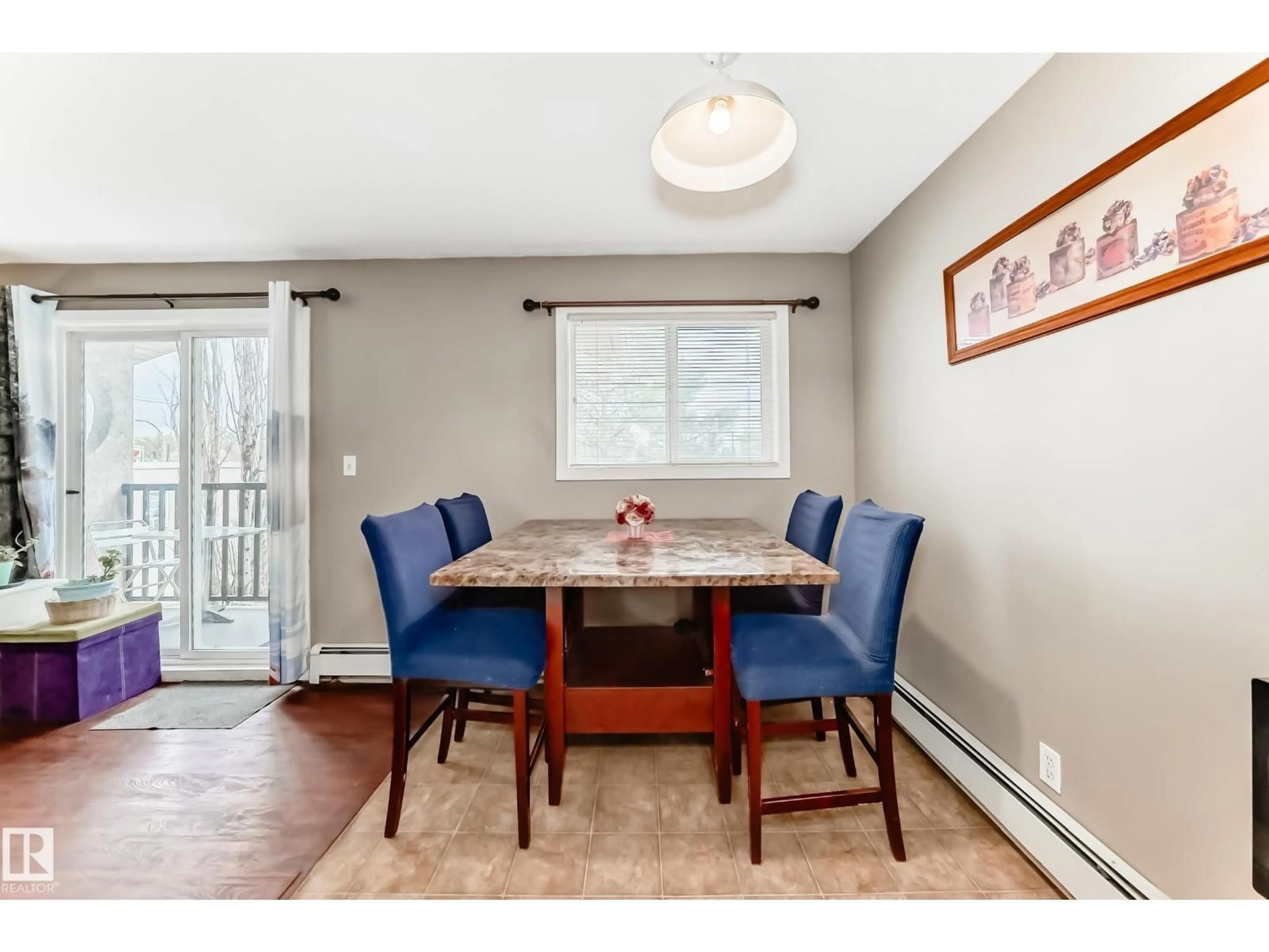 Dining room, wood/laminate floor for 305 - 12710 127 ST, Edmonton Alberta T5L1A5