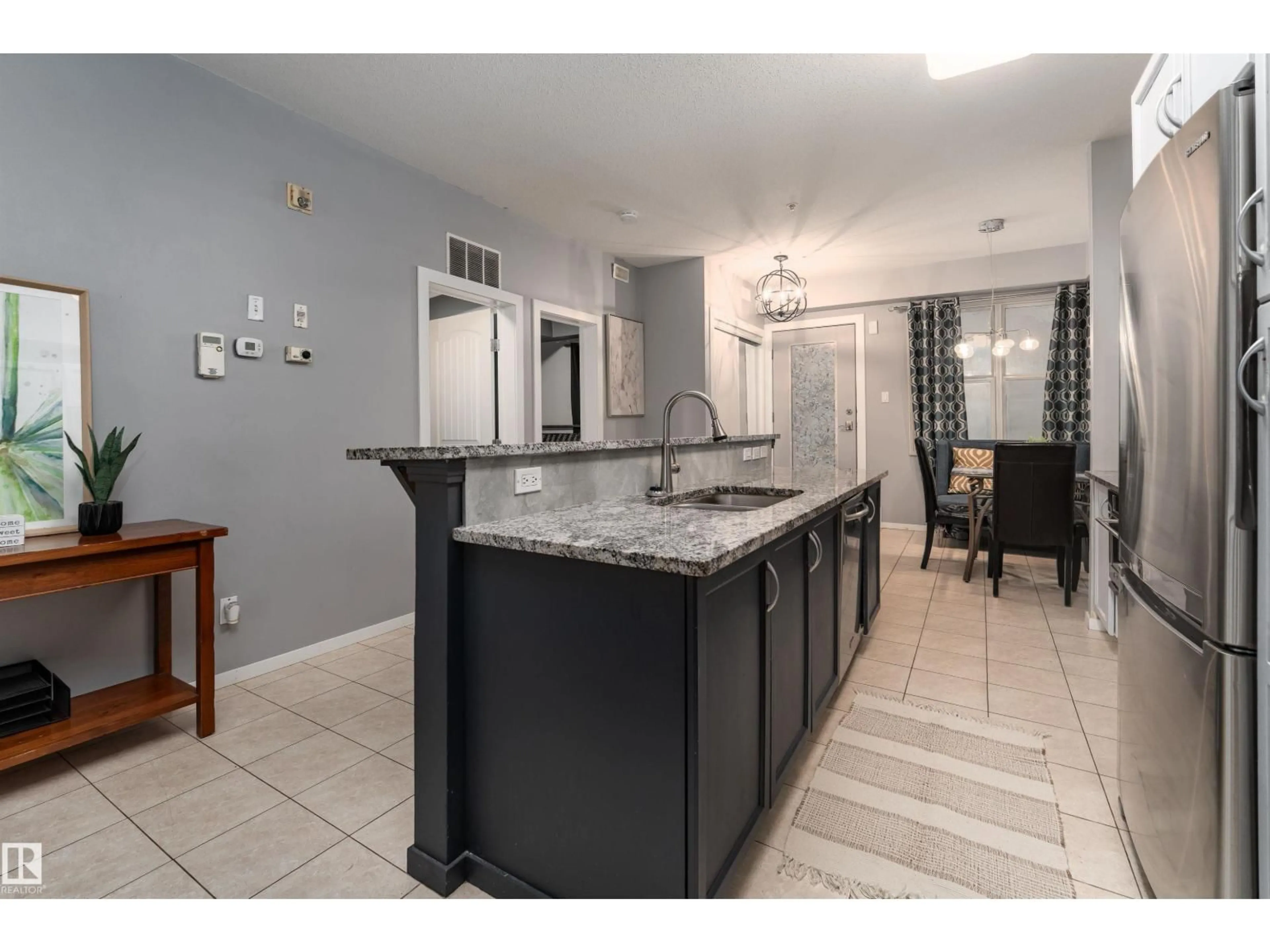 Open concept kitchen, ceramic/tile floor for #108 - 8619 111 ST, Edmonton Alberta T6G2W1