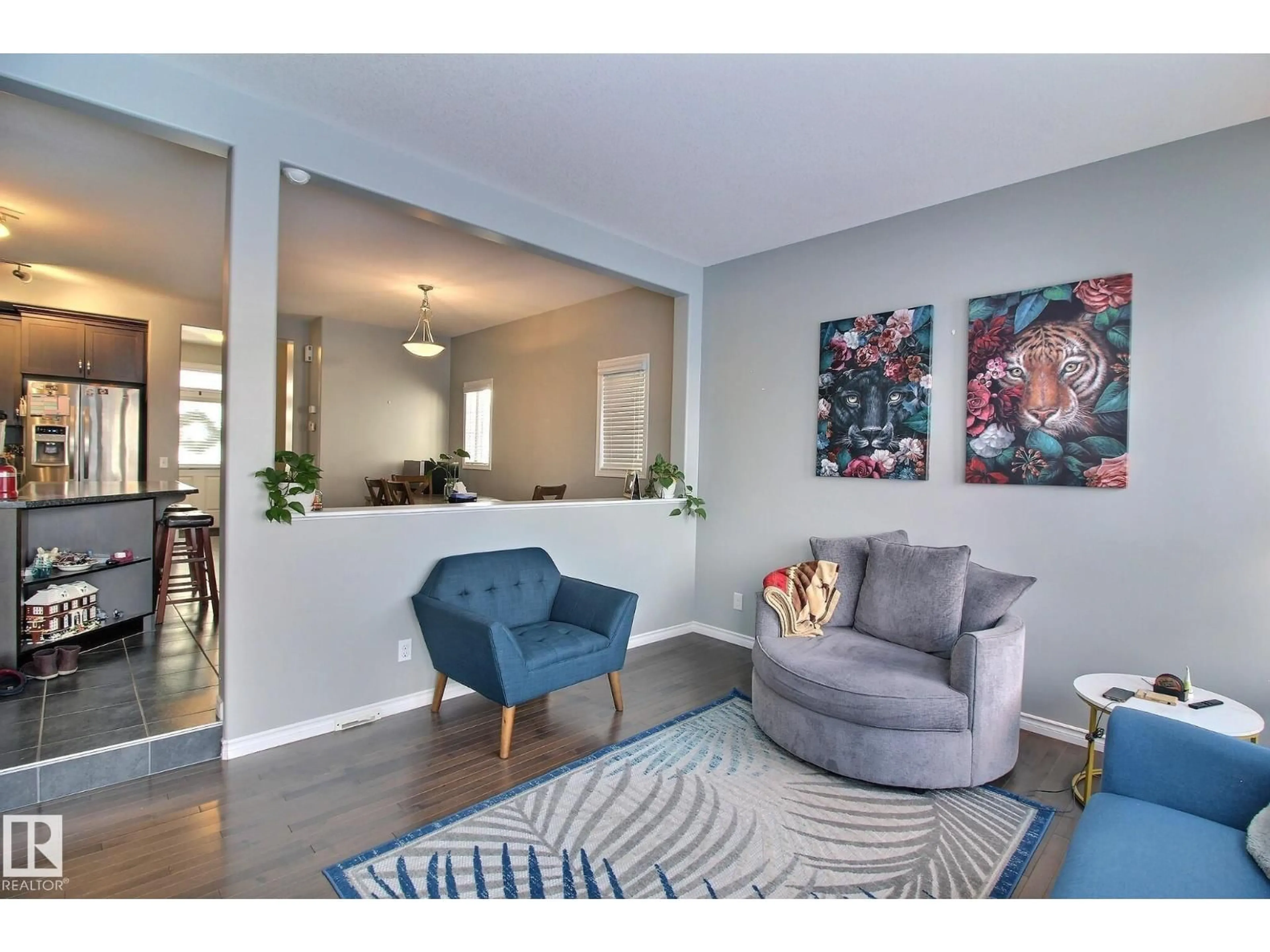 Living room with furniture, unknown for 6912 22 AV, Edmonton Alberta T6X0V4