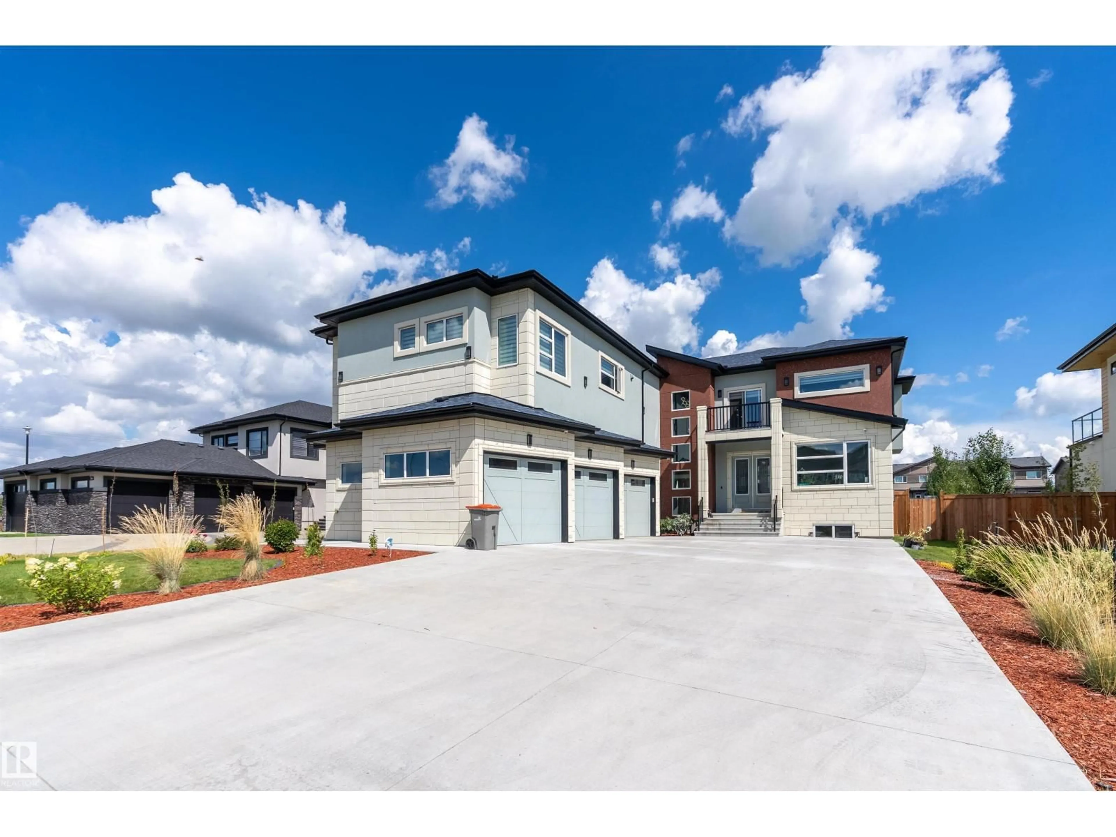 Home with brick exterior material, street for NE - 5811 28 ST, Rural Leduc County Alberta T4X0X5