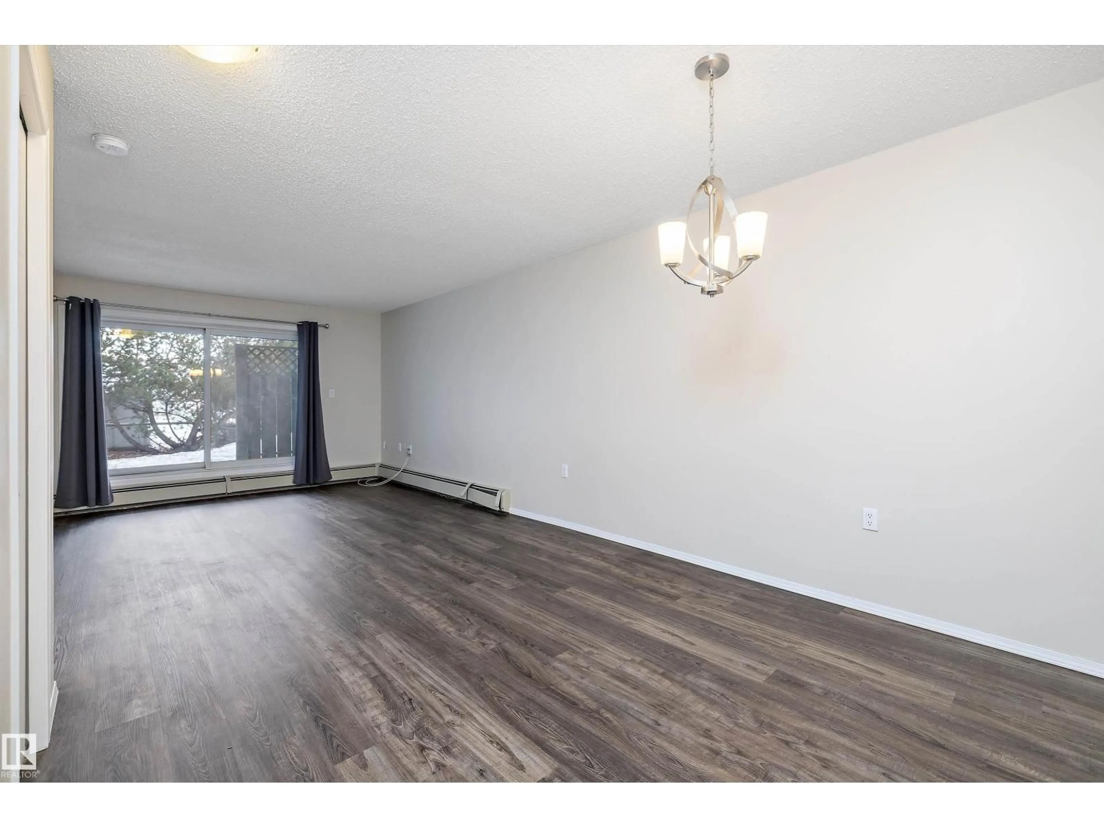 A pic of a room for #110 - 15503 106 ST, Edmonton Alberta T5X5W7