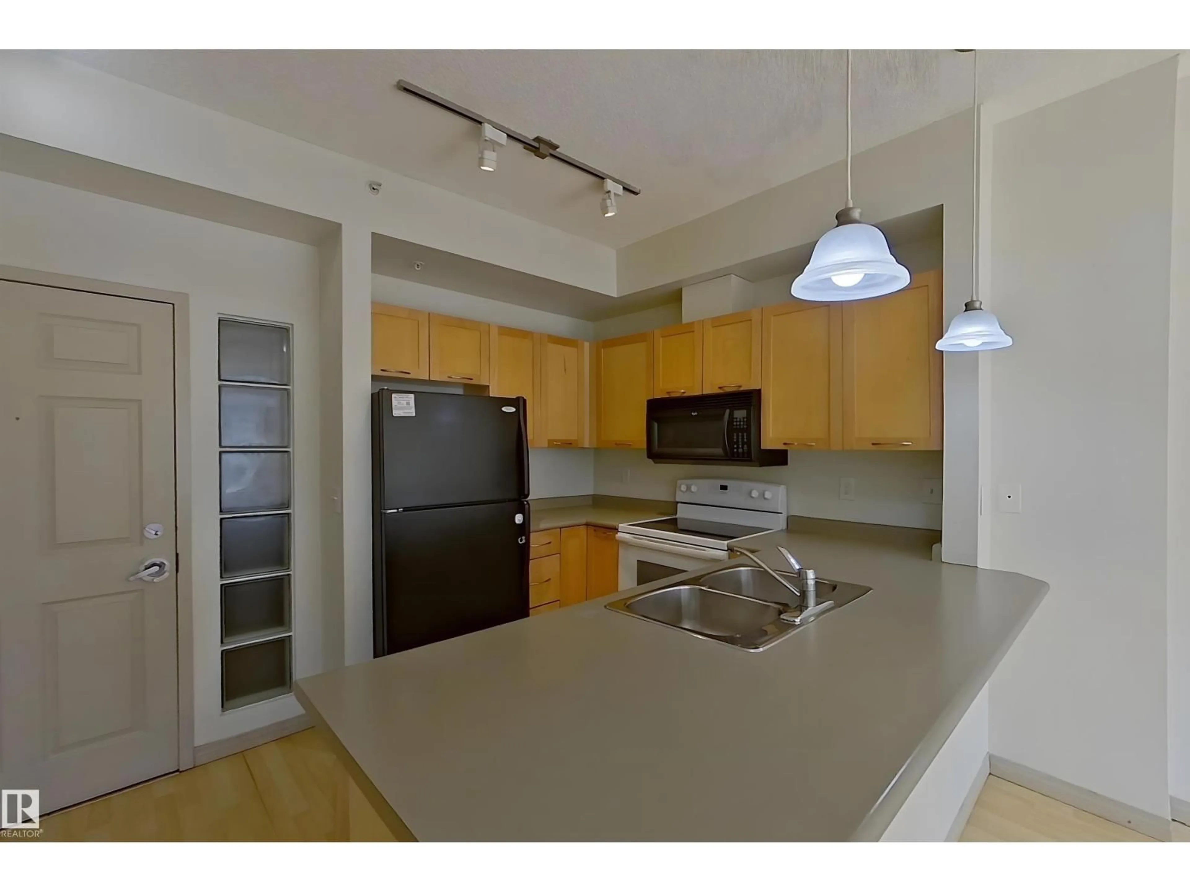 Standard kitchen, unknown for #1-518 - 4245 139 AV, Edmonton Alberta T5Y3E8