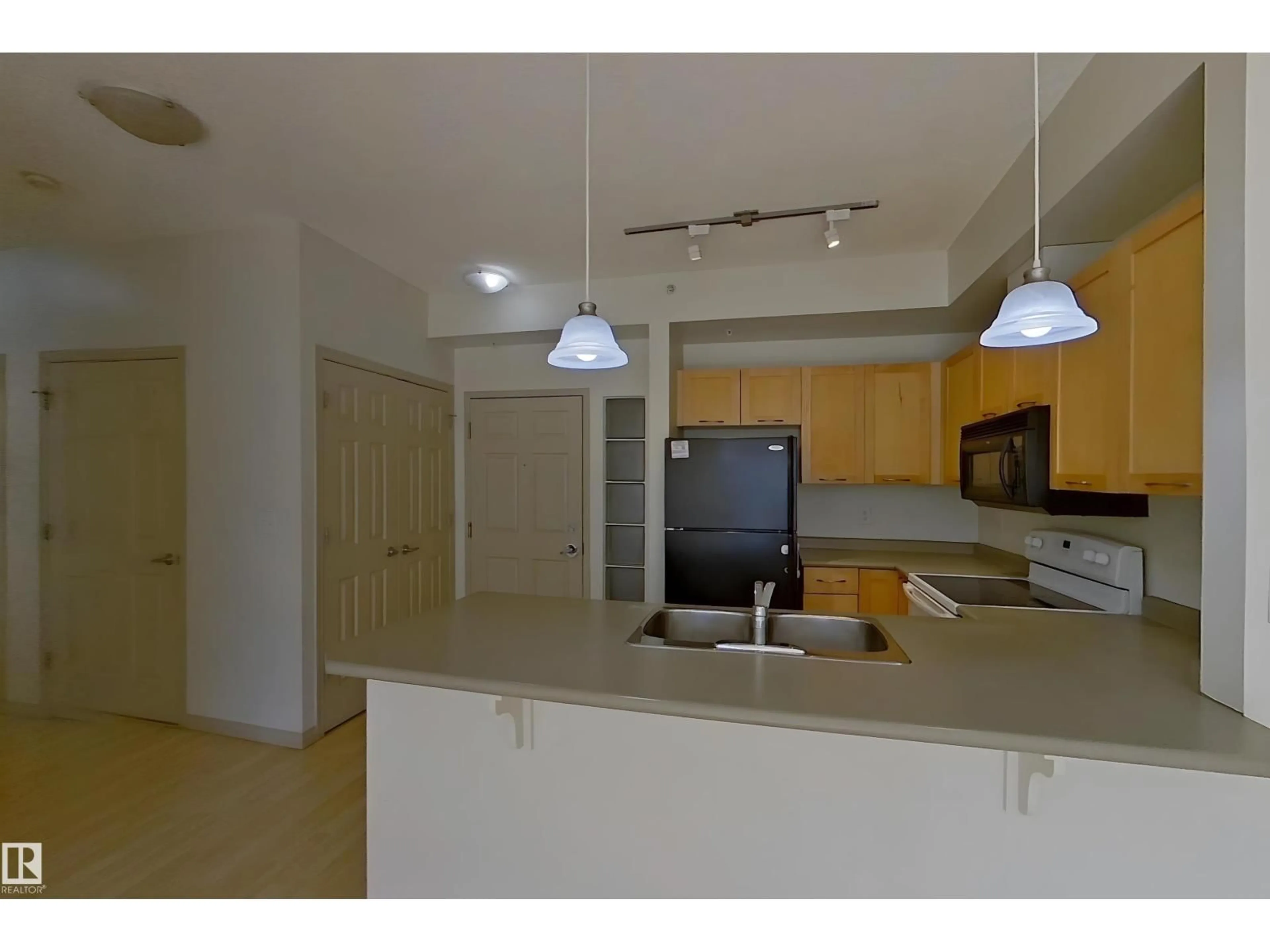Standard kitchen, unknown for #1-518 - 4245 139 AV, Edmonton Alberta T5Y3E8