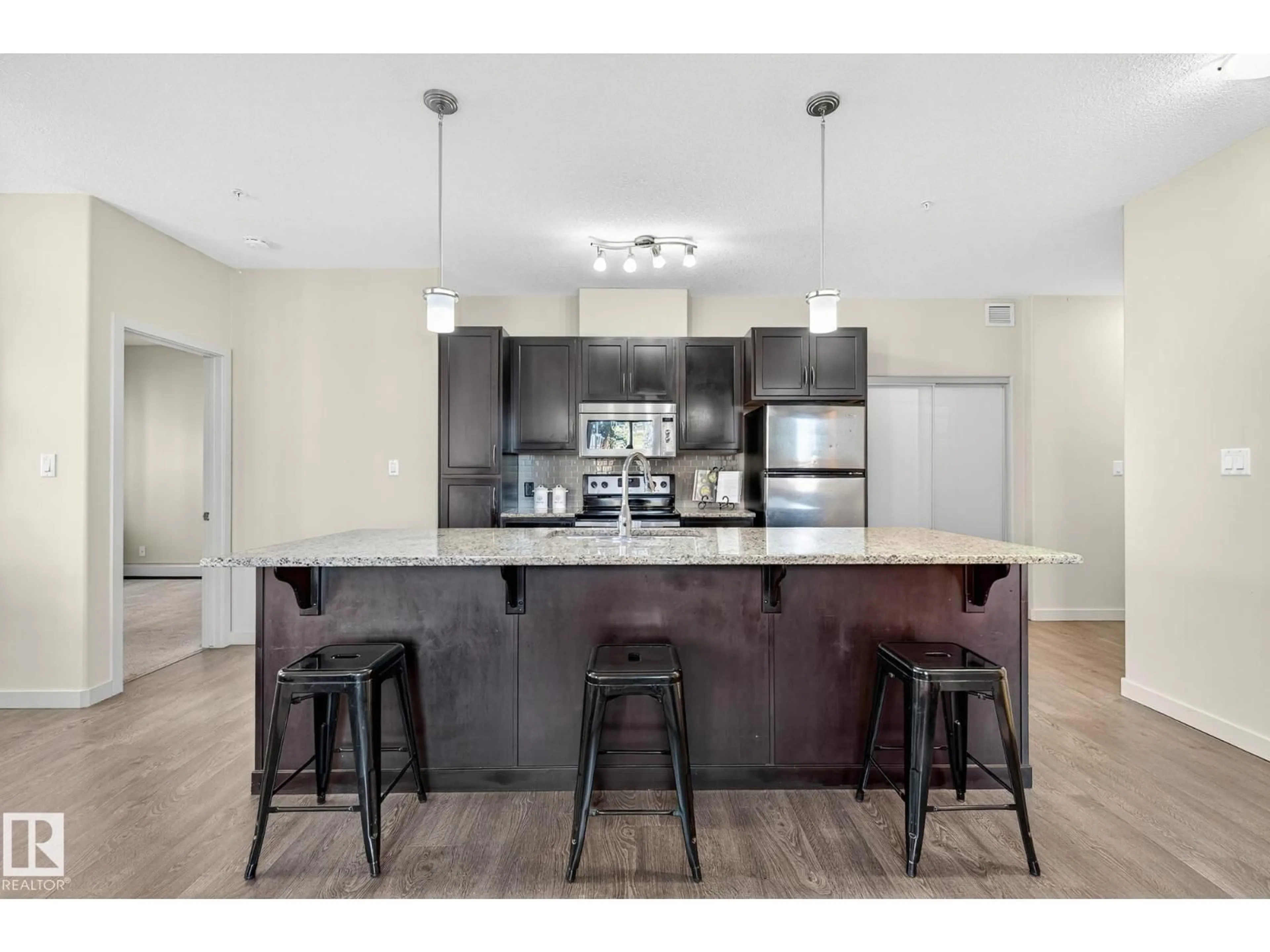Open concept kitchen, unknown for 308 - 247 AMBLESIDE LI, Edmonton Alberta T6W0V3