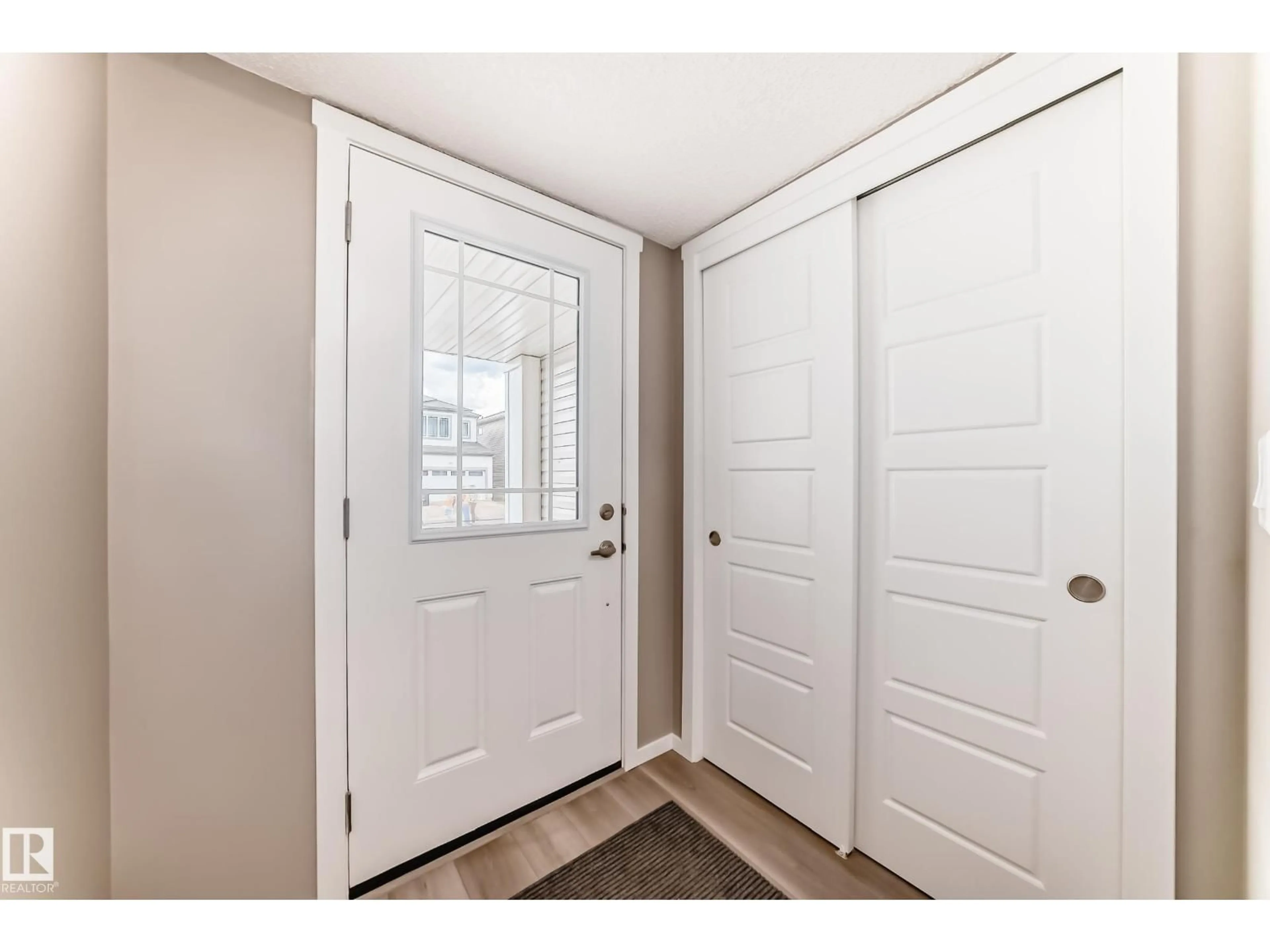 Indoor entryway for 20415 16 AV, Edmonton Alberta T6M3E6