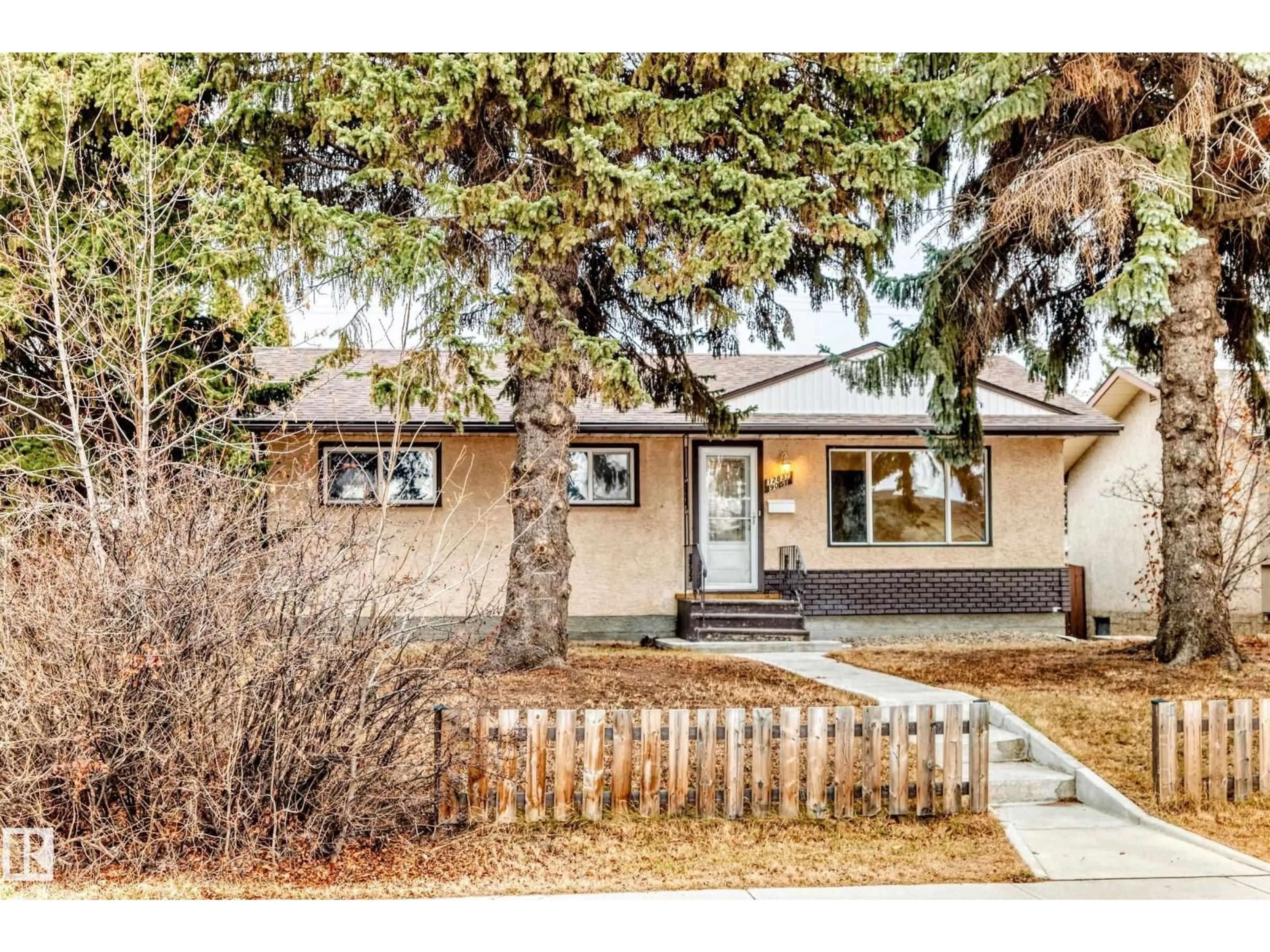 Home with vinyl exterior material, street for 12837 90 ST, Edmonton Alberta T5E3L7