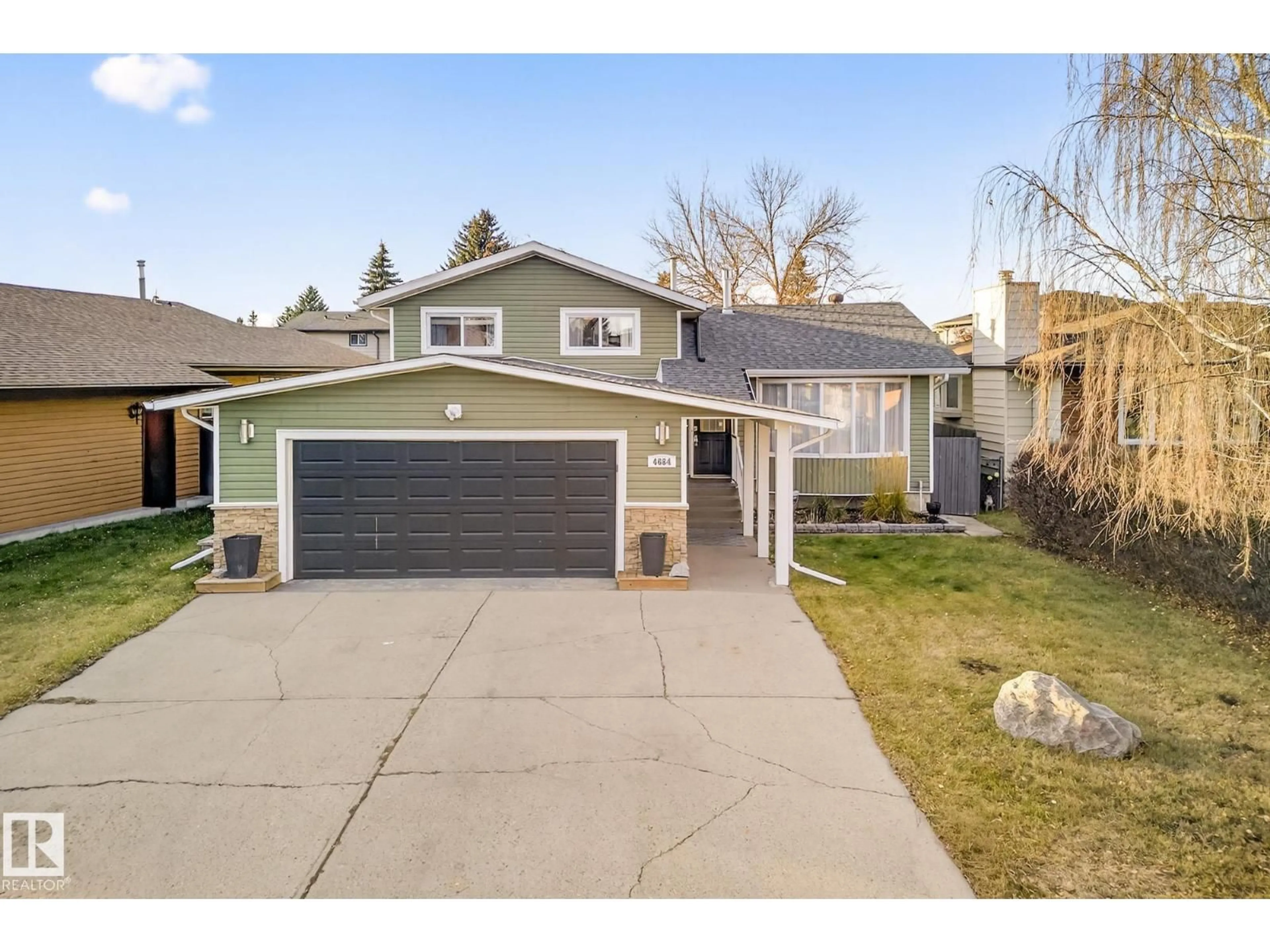 Home with vinyl exterior material, street for 4664 16A AV, Edmonton Alberta T6L2S2