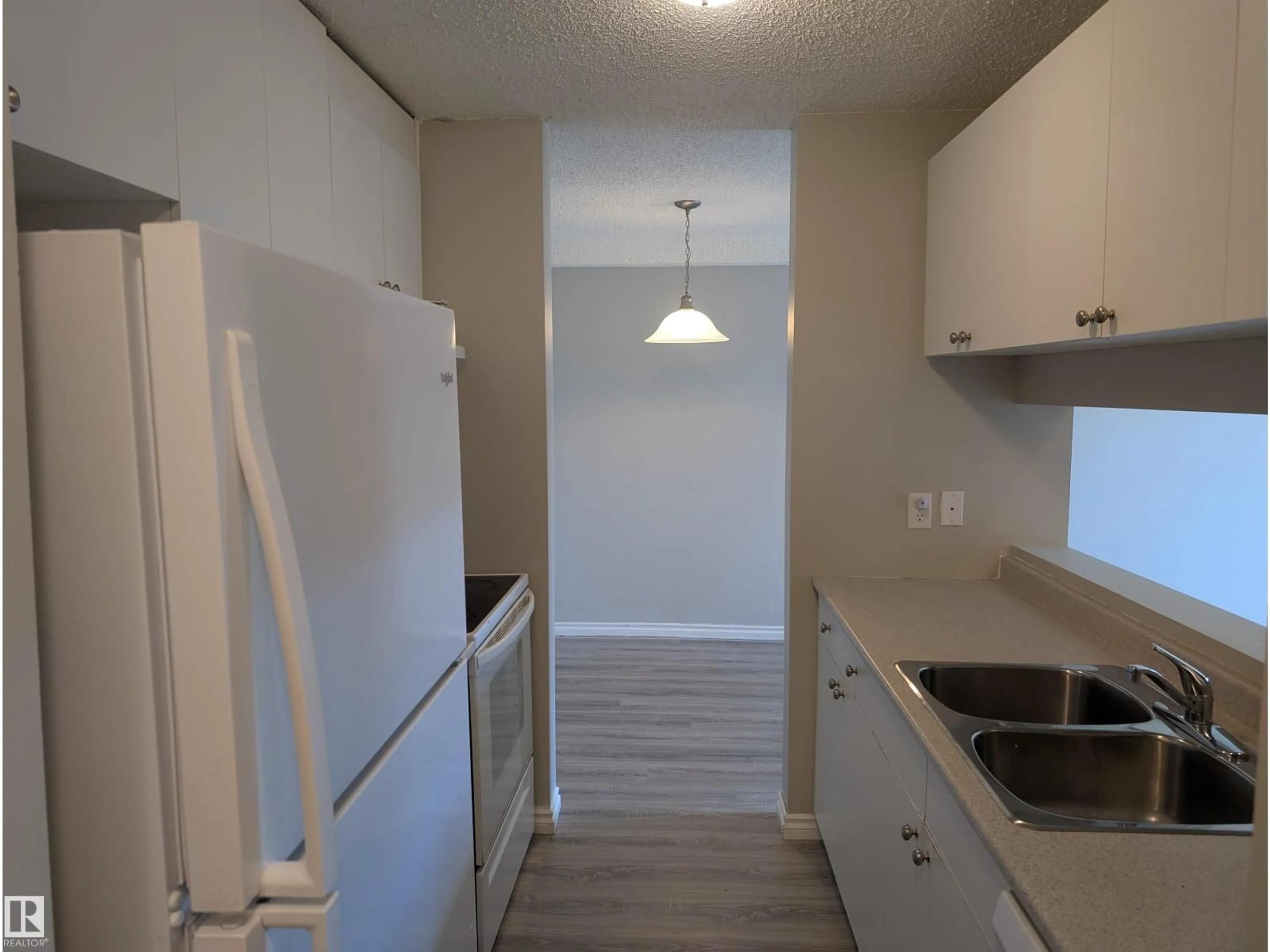 Standard kitchen, unknown for #110 - 5065 31 AV, Edmonton Alberta T6L6S5