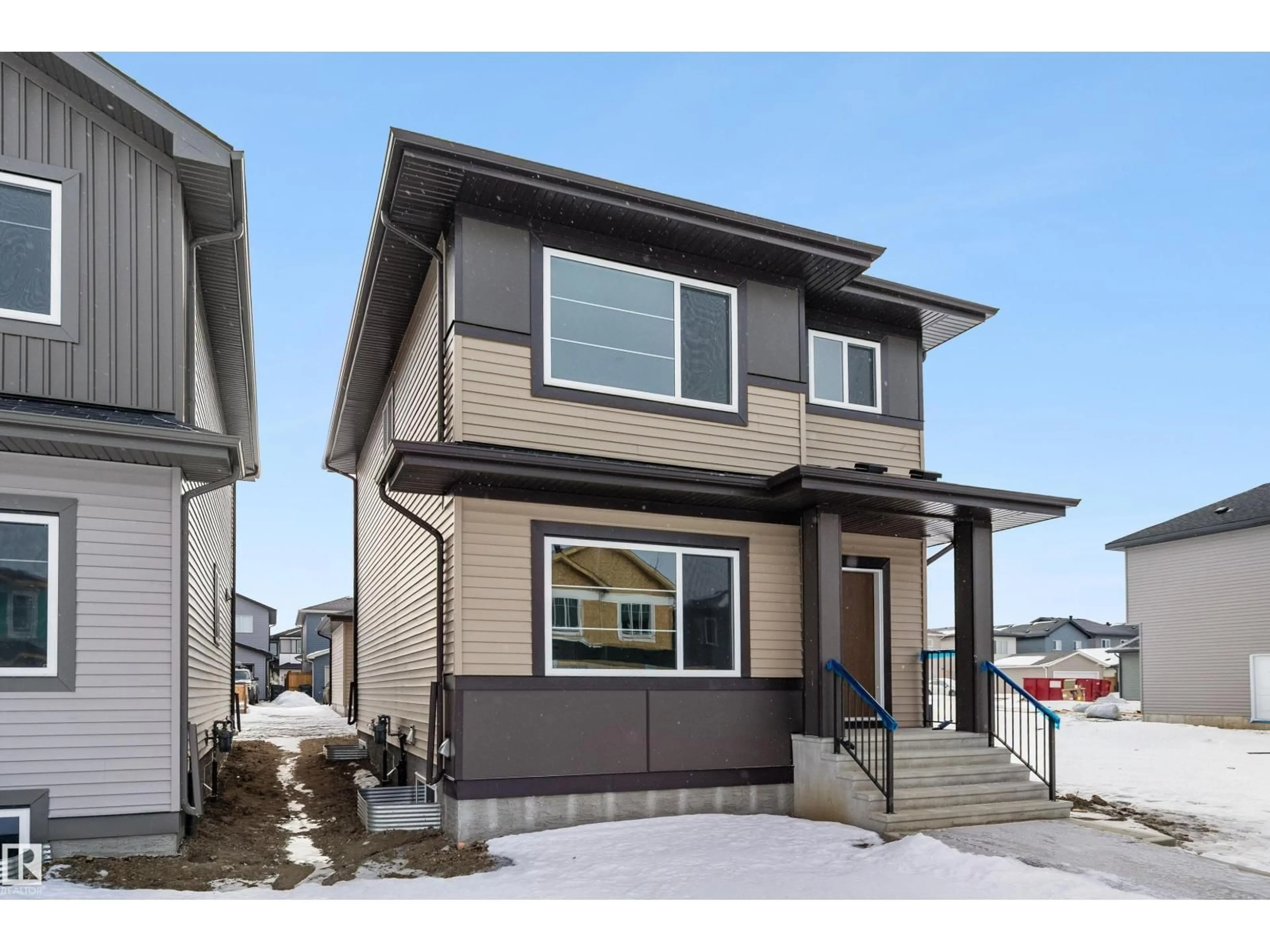Home with vinyl exterior material, street for 70 PATRIOT WY, Spruce Grove Alberta T7X4E8