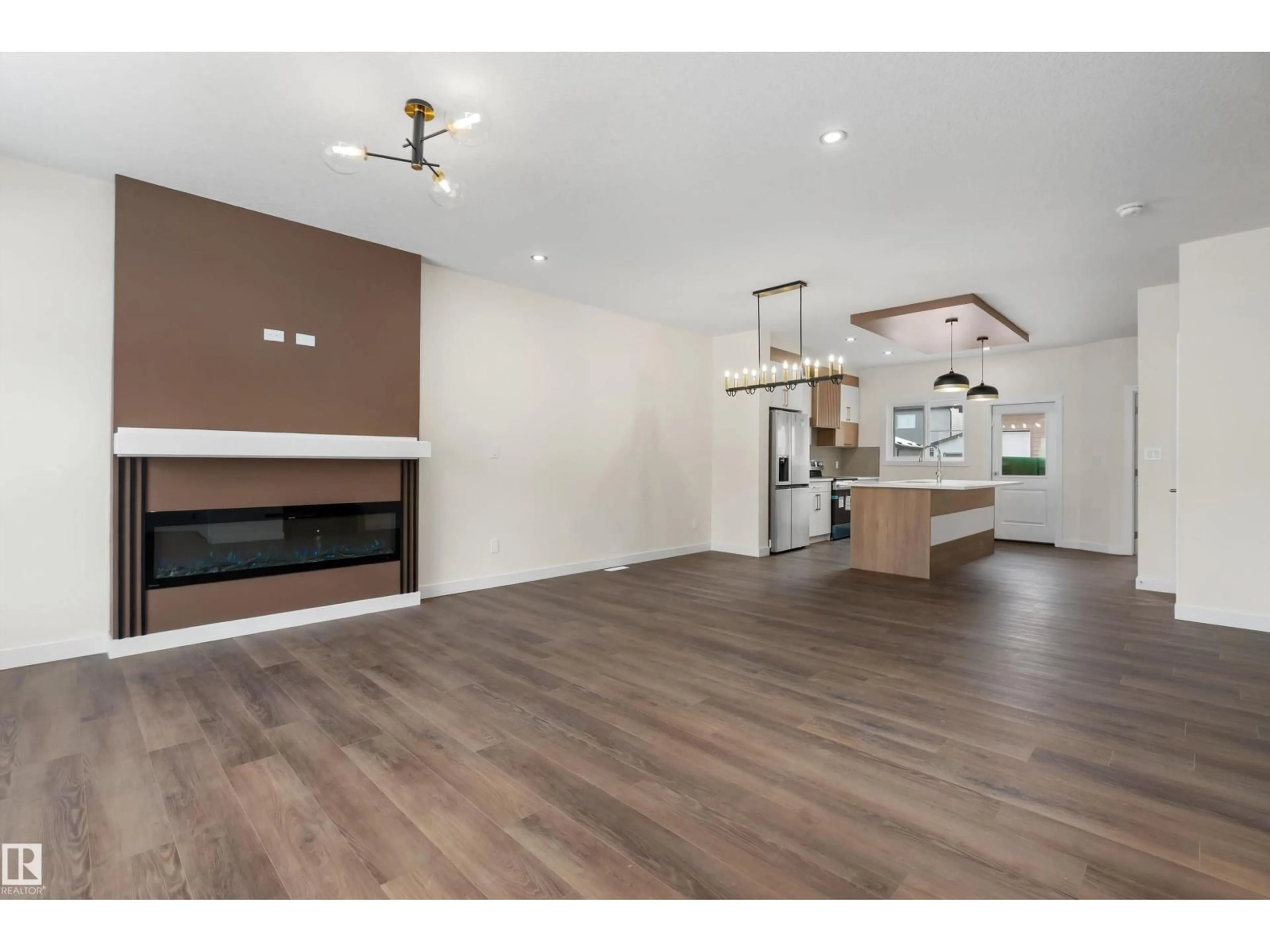 Open concept kitchen, wood/laminate floor for 70 PATRIOT WY, Spruce Grove Alberta T7X4E8