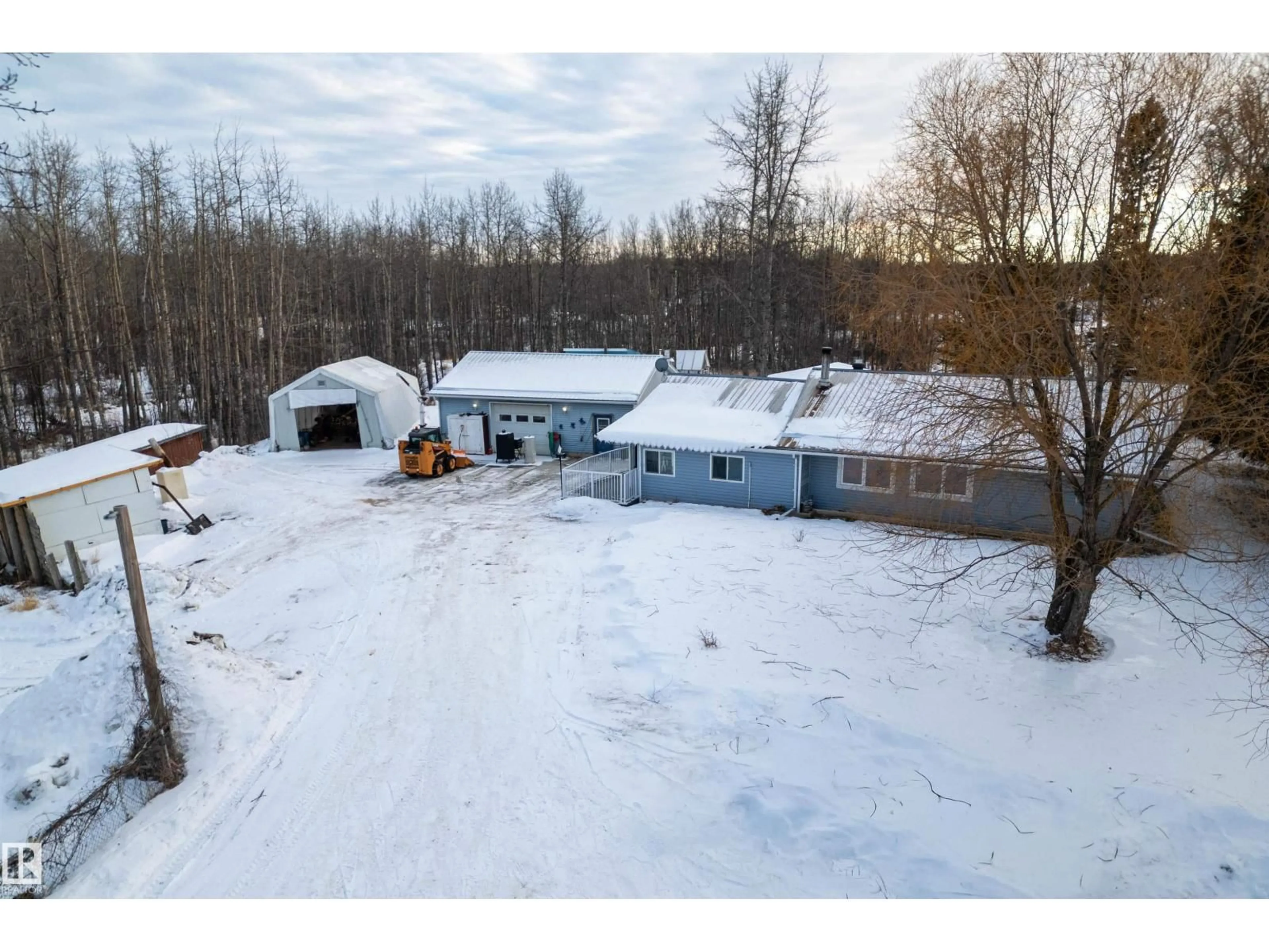 A pic from outside/outdoor area/front of a property/back of a property/a pic from drone, unknown for 53319 - 308 RGE ROAD 31, Rural Parkland County Alberta T7Y0E3