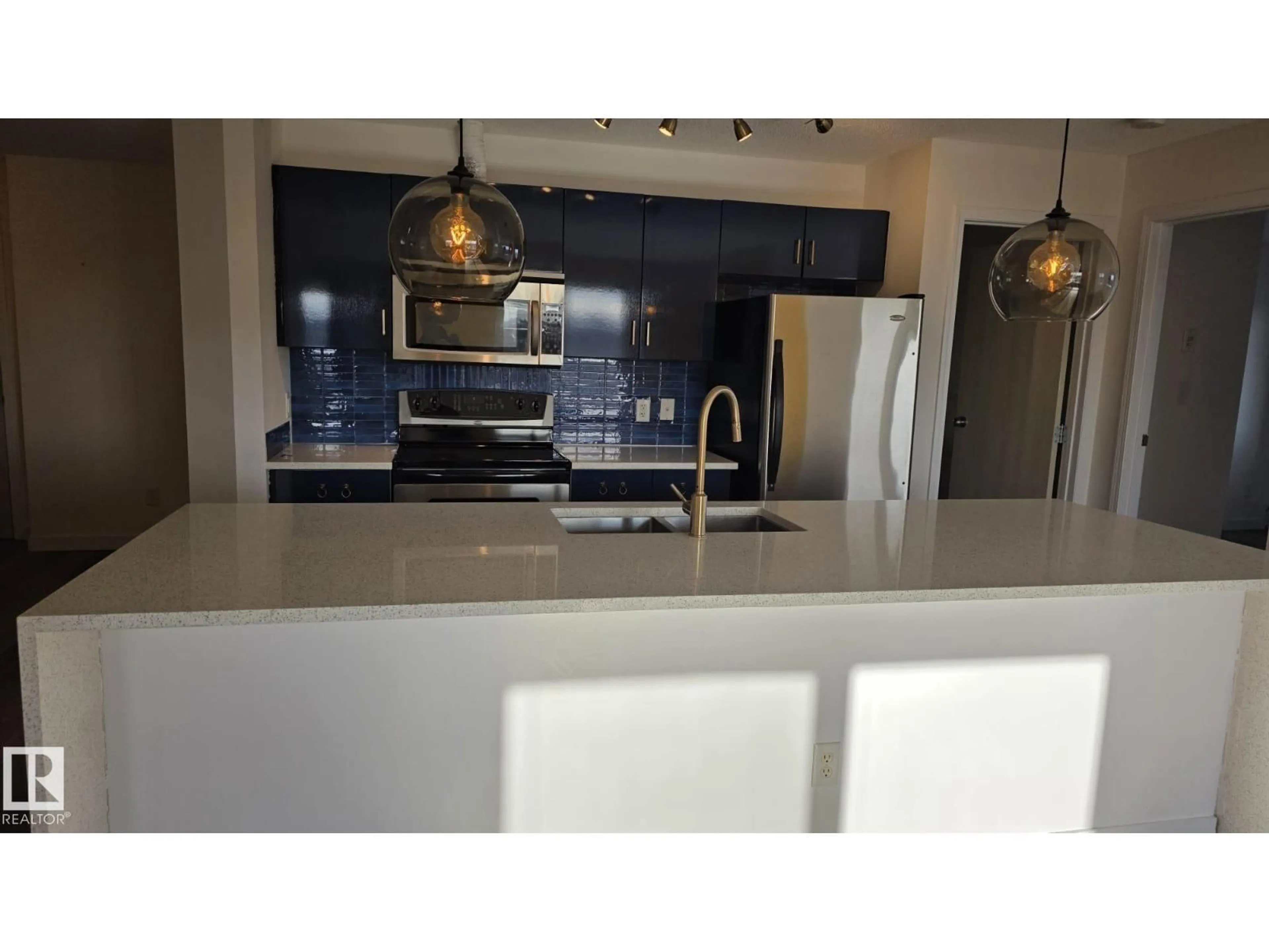 Open concept kitchen, unknown for 1188 - 415 HYNDMAN RD, Edmonton Alberta T5A0E9