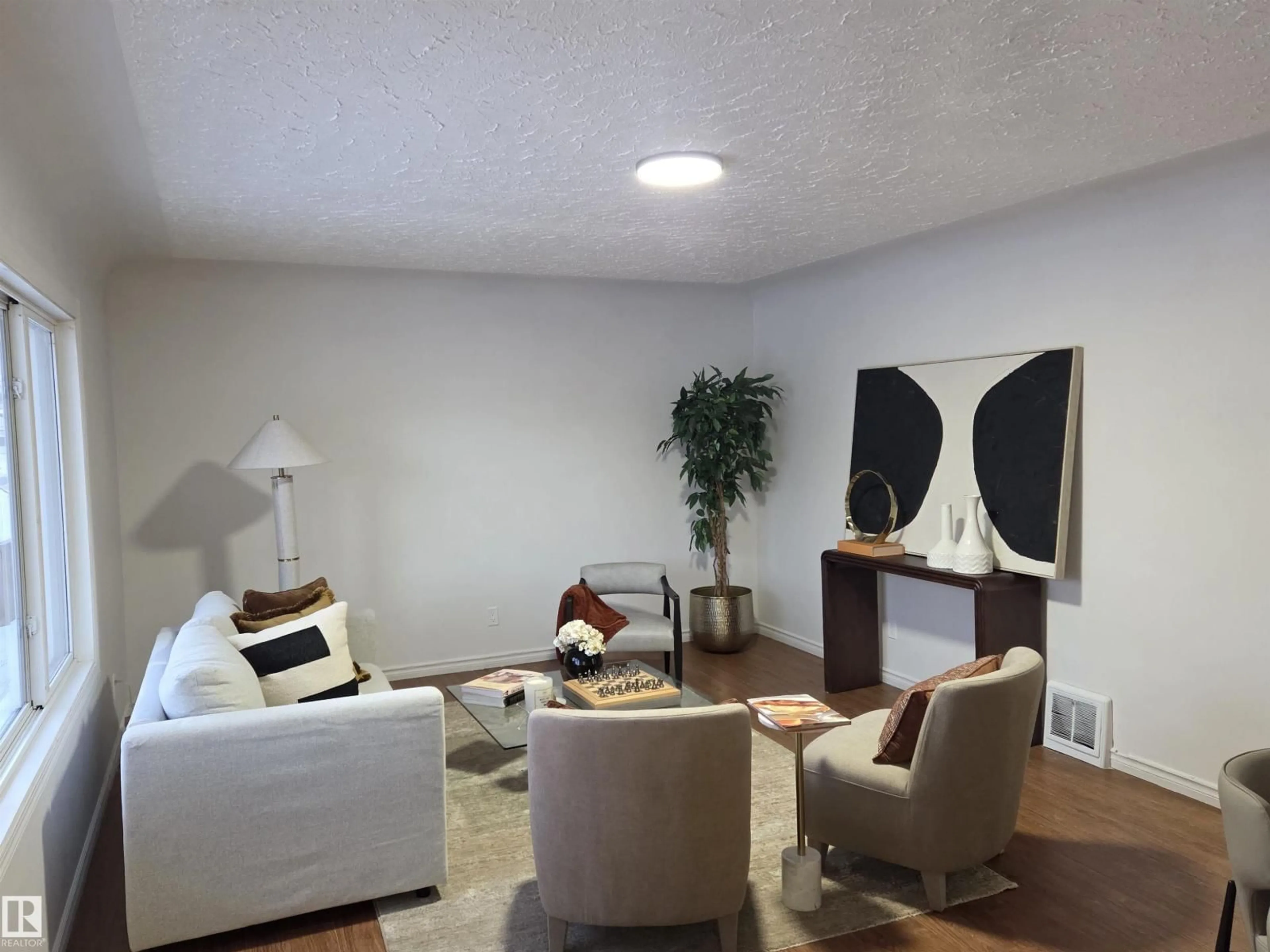 Living room with furniture, unknown for 13023 SHERBROOKE AV, Edmonton Alberta T5L4E6