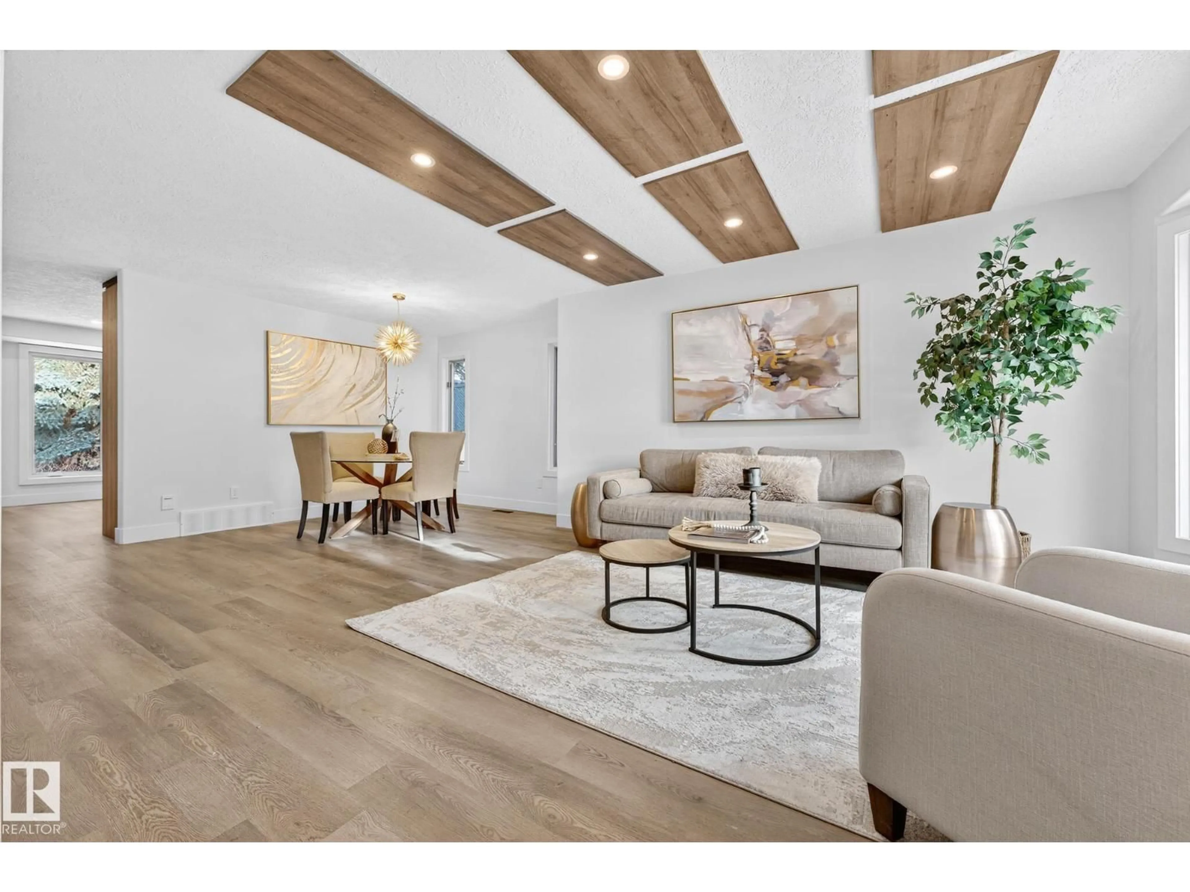 Living room with furniture, wood/laminate floor for 7924 157 AV, Edmonton Alberta T5Z2T4