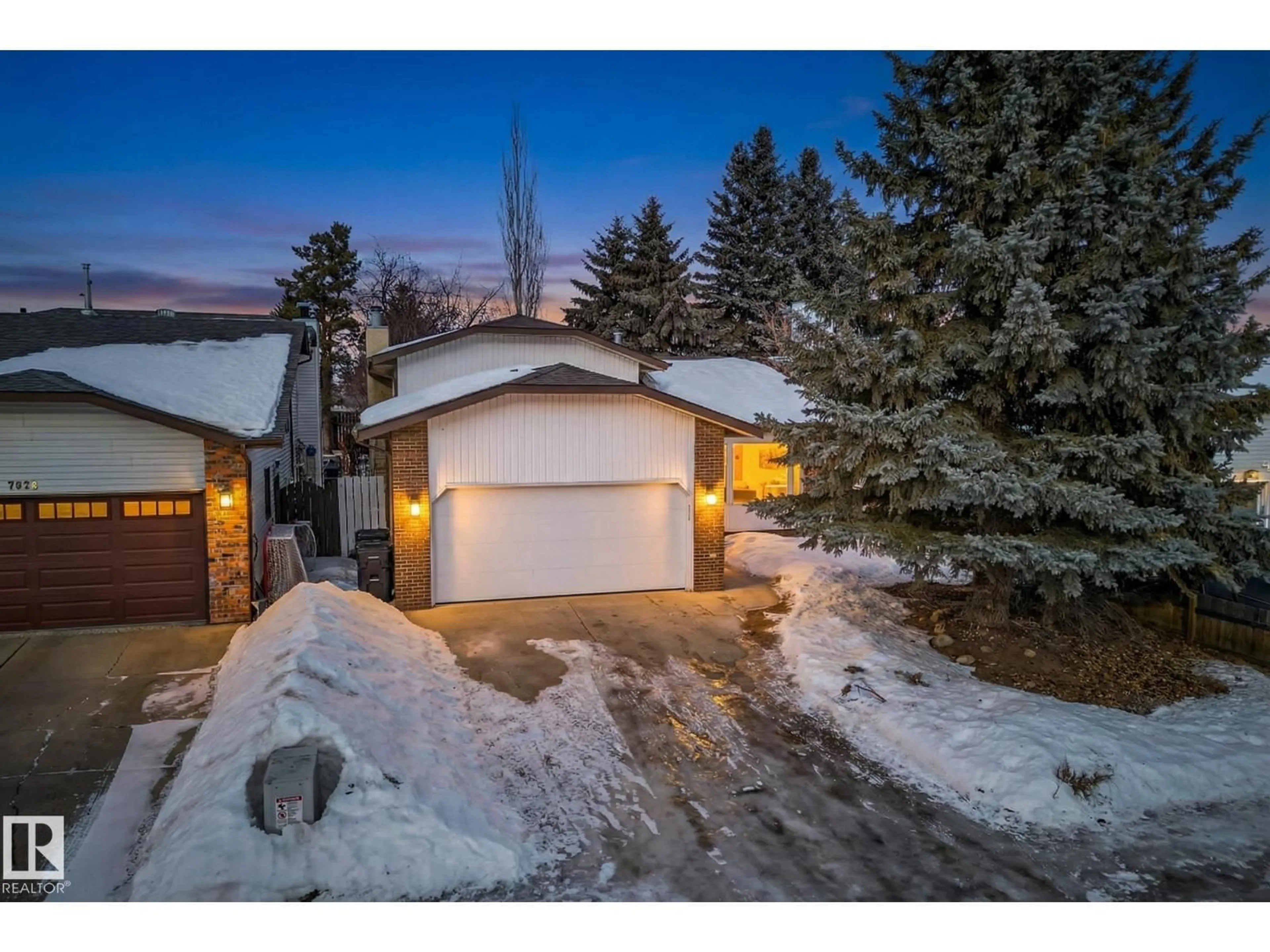 A pic from outside/outdoor area/front of a property/back of a property/a pic from drone, street for 7924 157 AV, Edmonton Alberta T5Z2T4