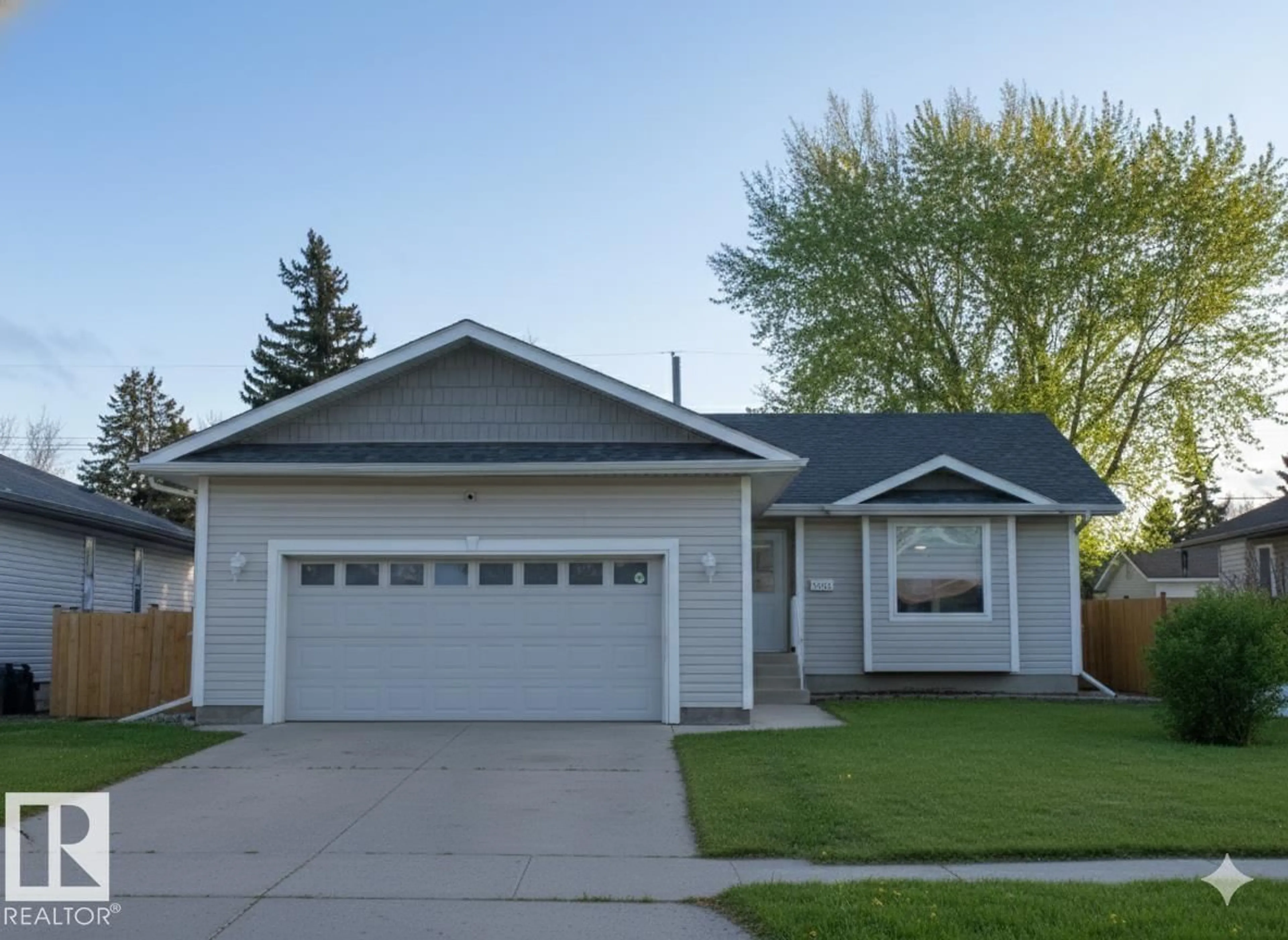 Home with vinyl exterior material, street for 5146 54 AV, Redwater Alberta T0A2W0