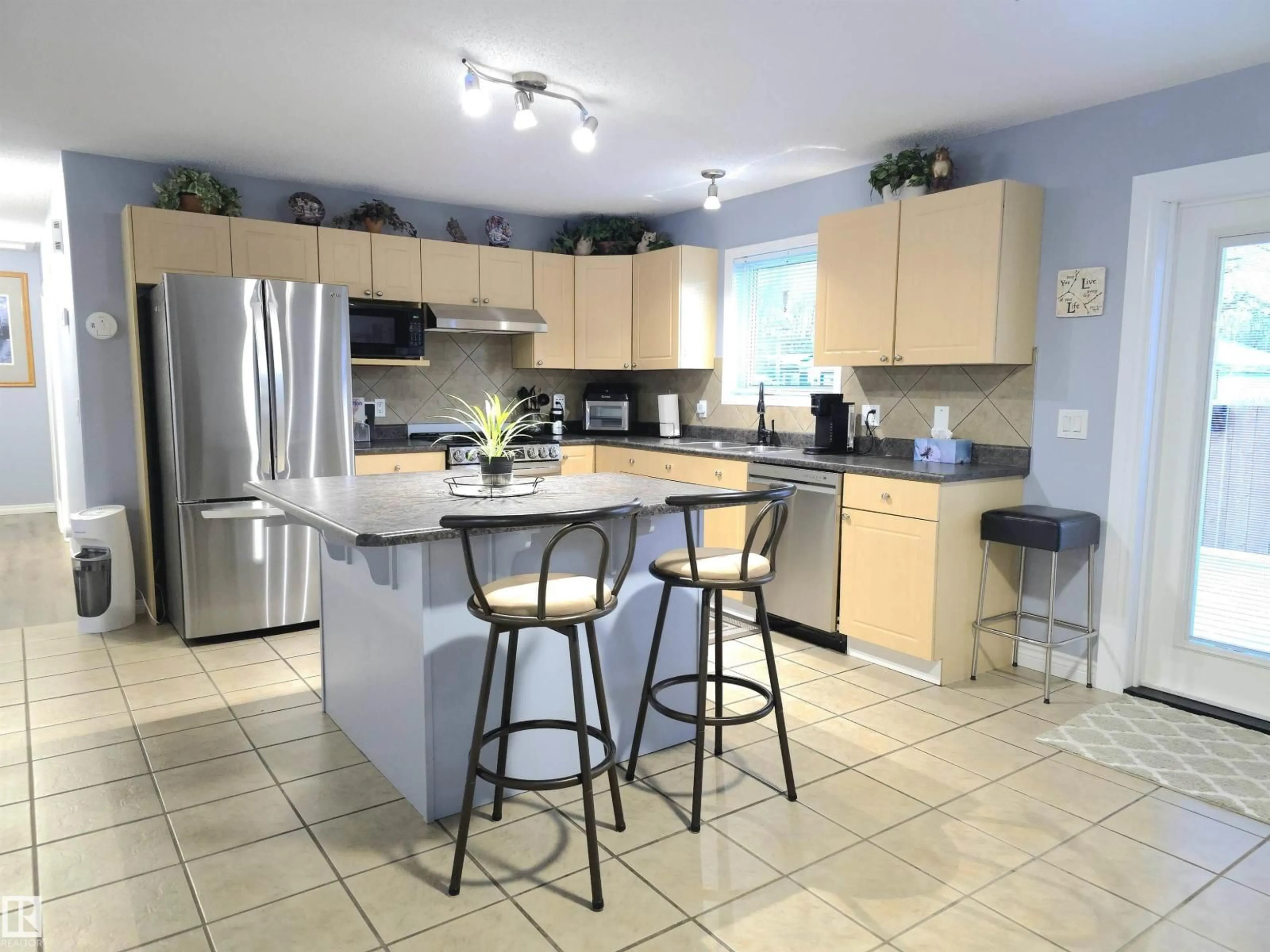 Open concept kitchen, ceramic/tile floor for 5146 54 AV, Redwater Alberta T0A2W0