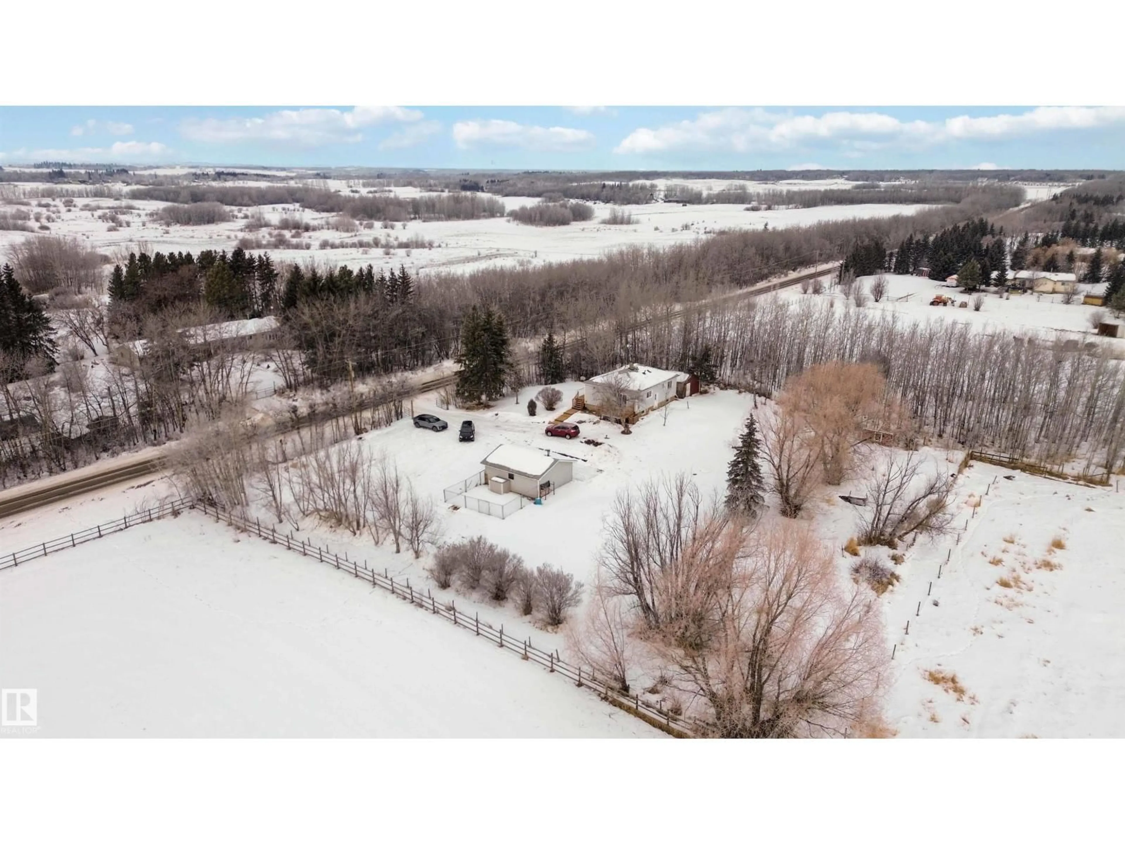 A pic from outside/outdoor area/front of a property/back of a property/a pic from drone, water/lake/river/ocean view for 51139 RGE ROAD 231, Rural Strathcona County Alberta T2W2P5