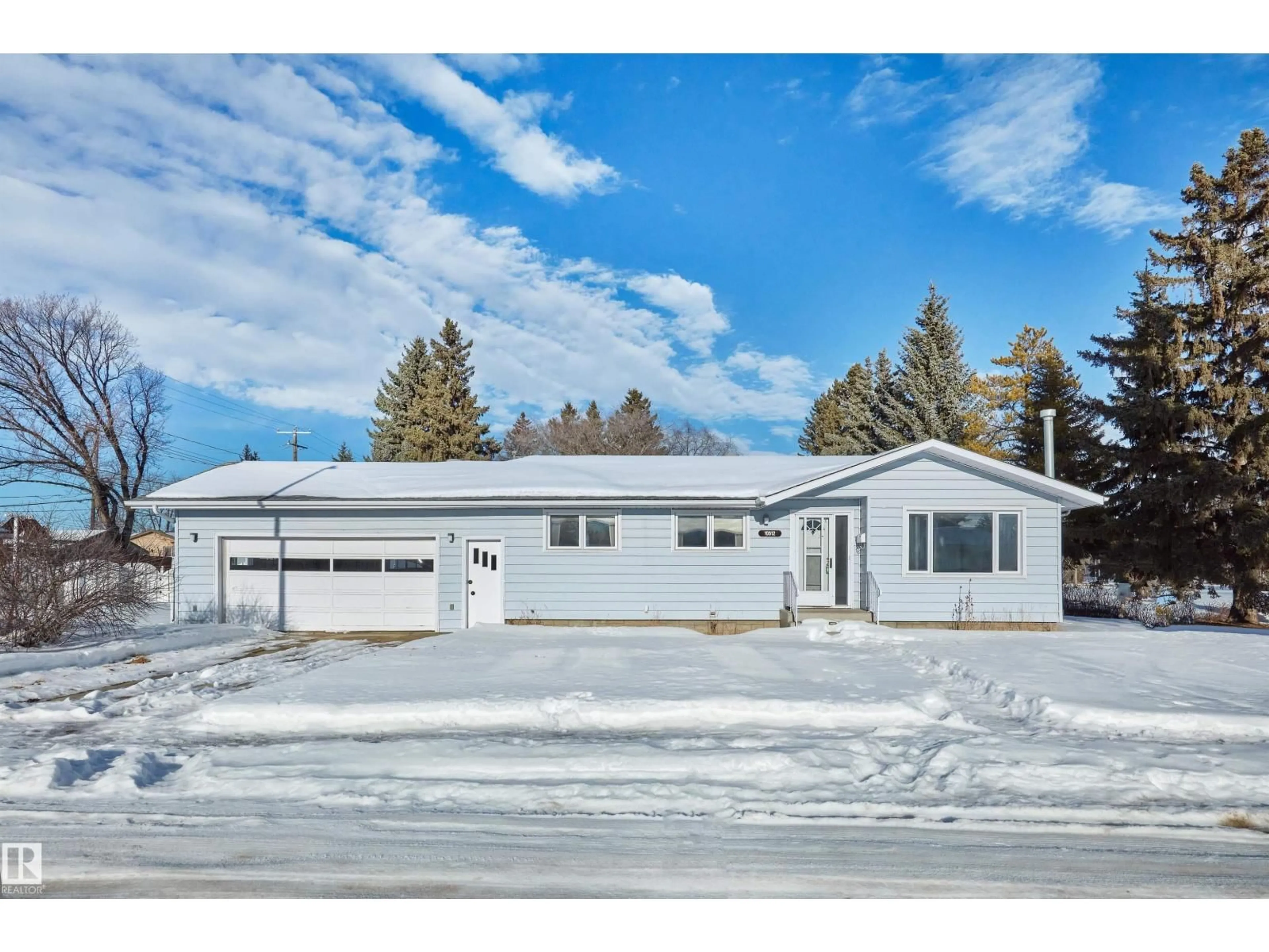 Home with vinyl exterior material, street for 10512 54 AV, Edmonton Alberta T6H0T7