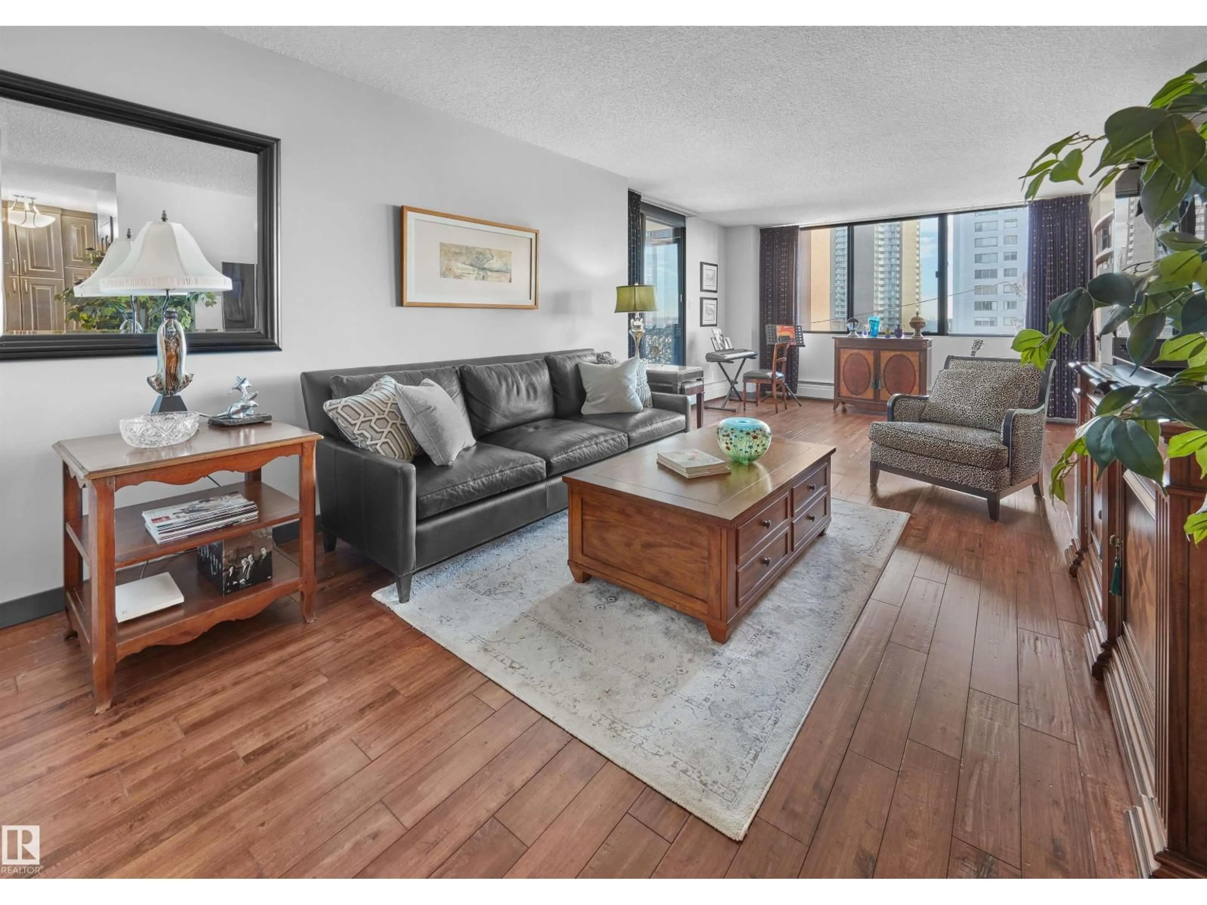 Living room with furniture, wood/laminate floor for #304 - 9921 104 ST NW, Edmonton Alberta T5K2K3