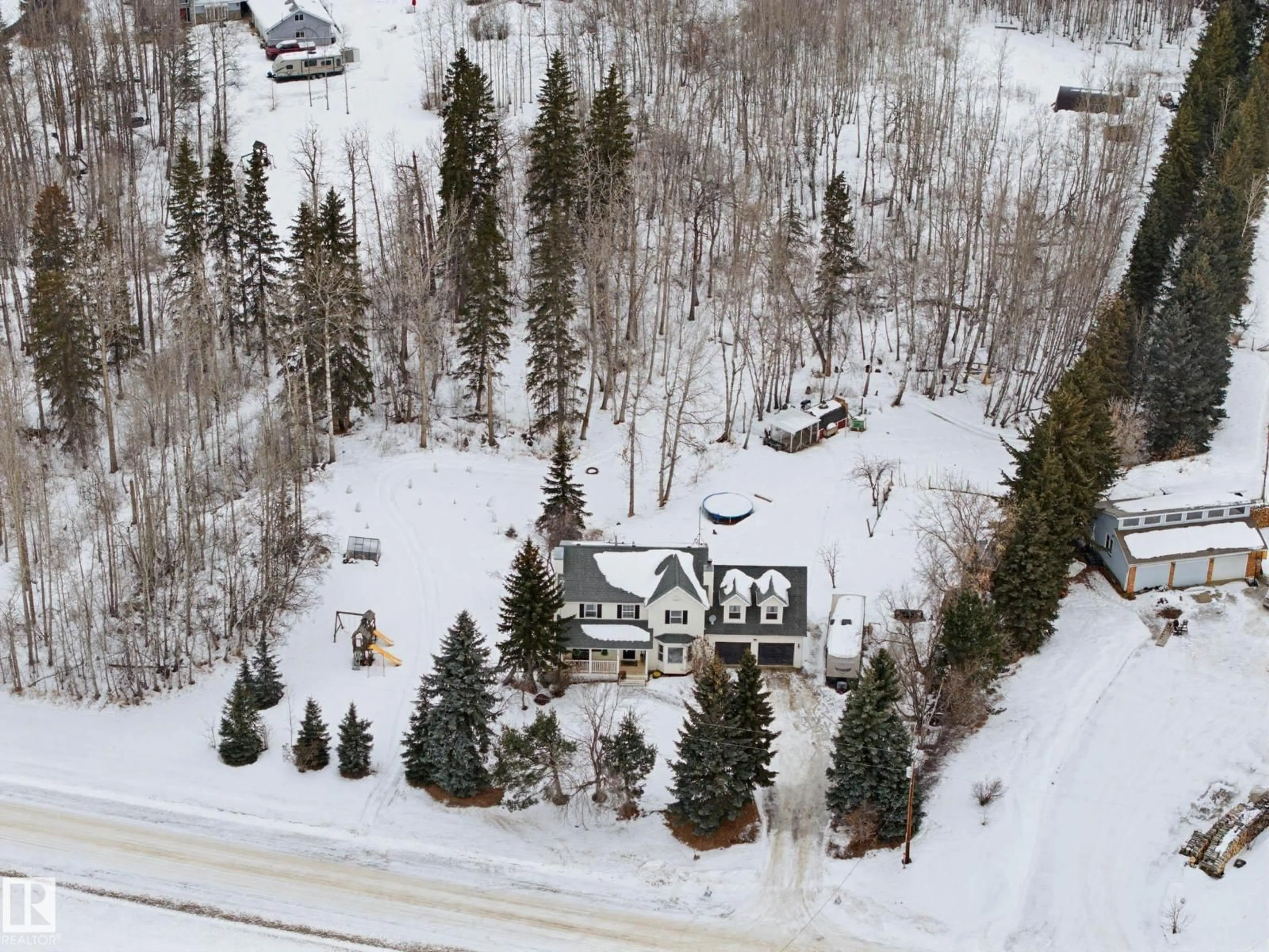 A pic from outside/outdoor area/front of a property/back of a property/a pic from drone, street for 53504 - 33 RGE ROAD 280, Rural Parkland County Alberta T7X3V6