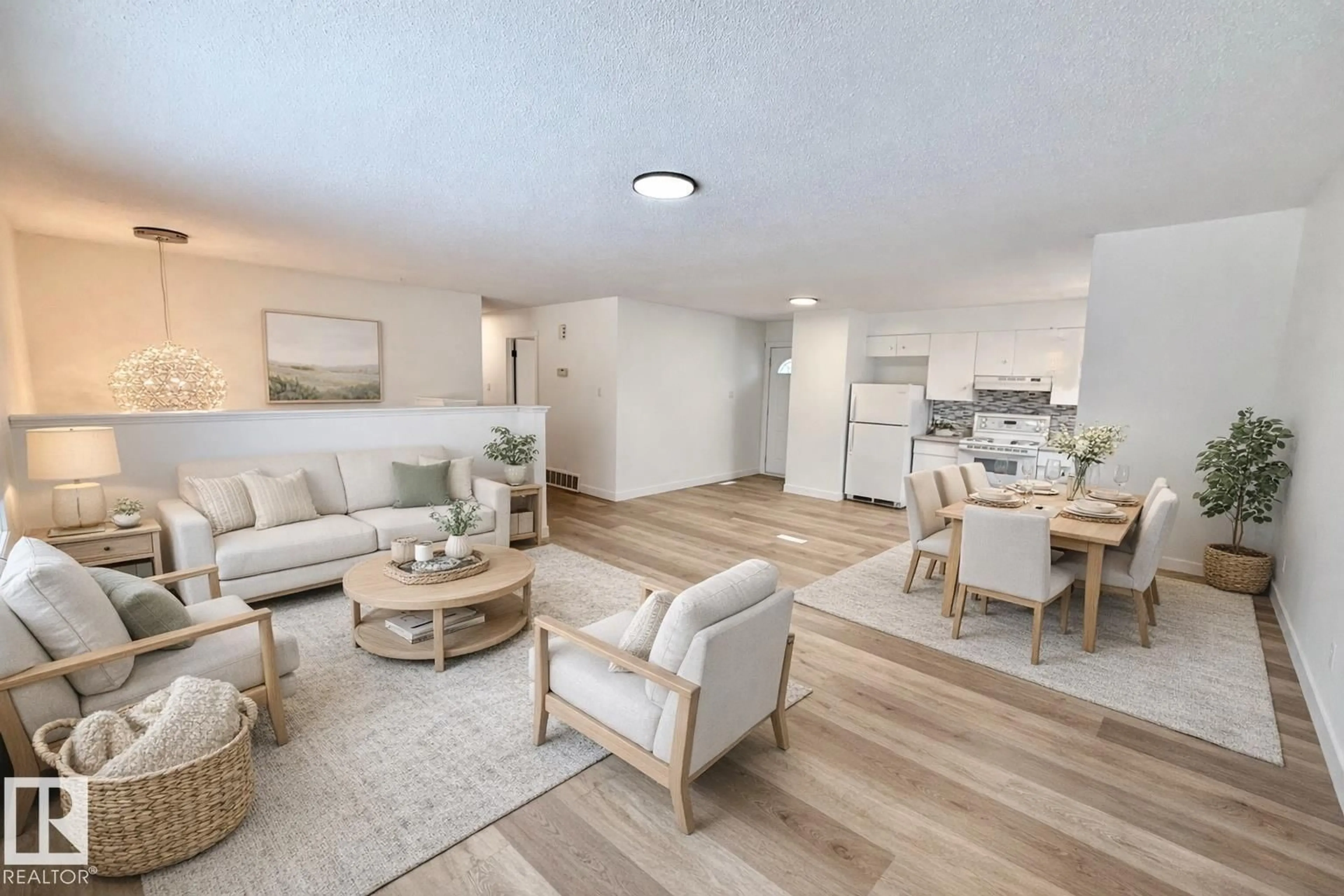 Living room with furniture, wood/laminate floor for NW - 15424 99 AV, Edmonton Alberta T5P4K5