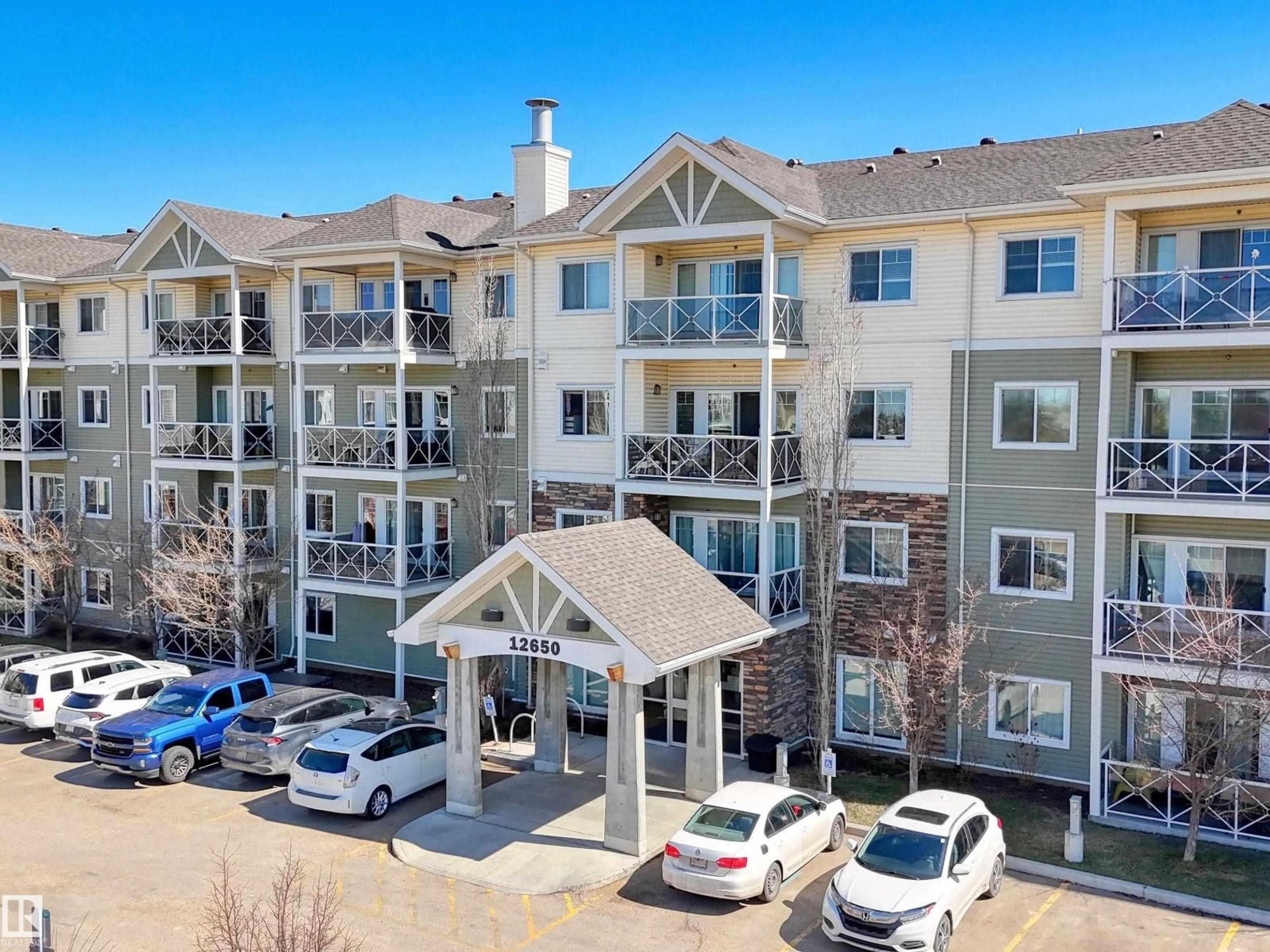 A pic from outside/outdoor area/front of a property/back of a property/a pic from drone, mountain view for #303 - 12650 142 AV, Edmonton Alberta T5X0J4