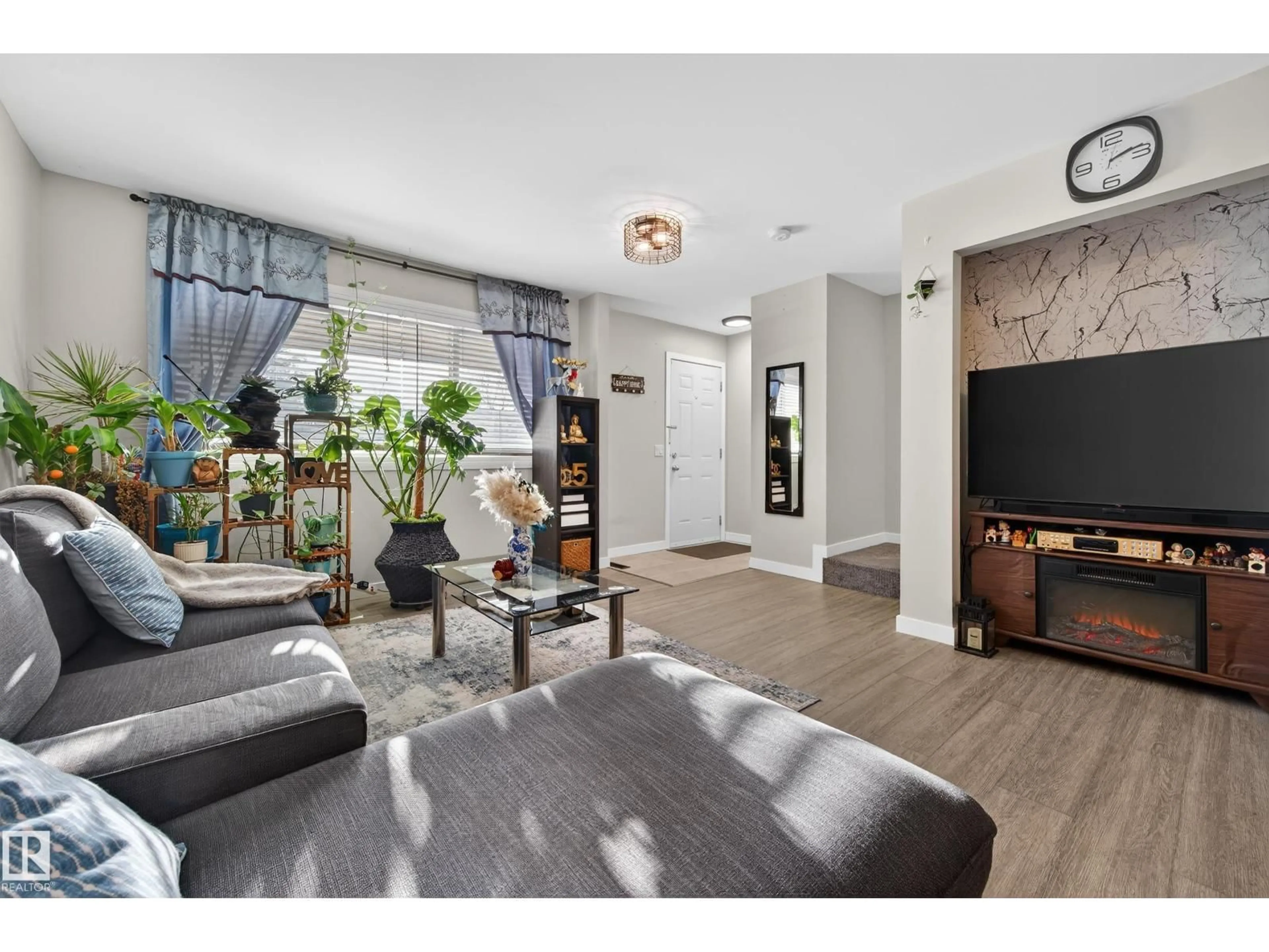 Living room with furniture, unknown for 4755 35 AV, Edmonton Alberta T6L3P8