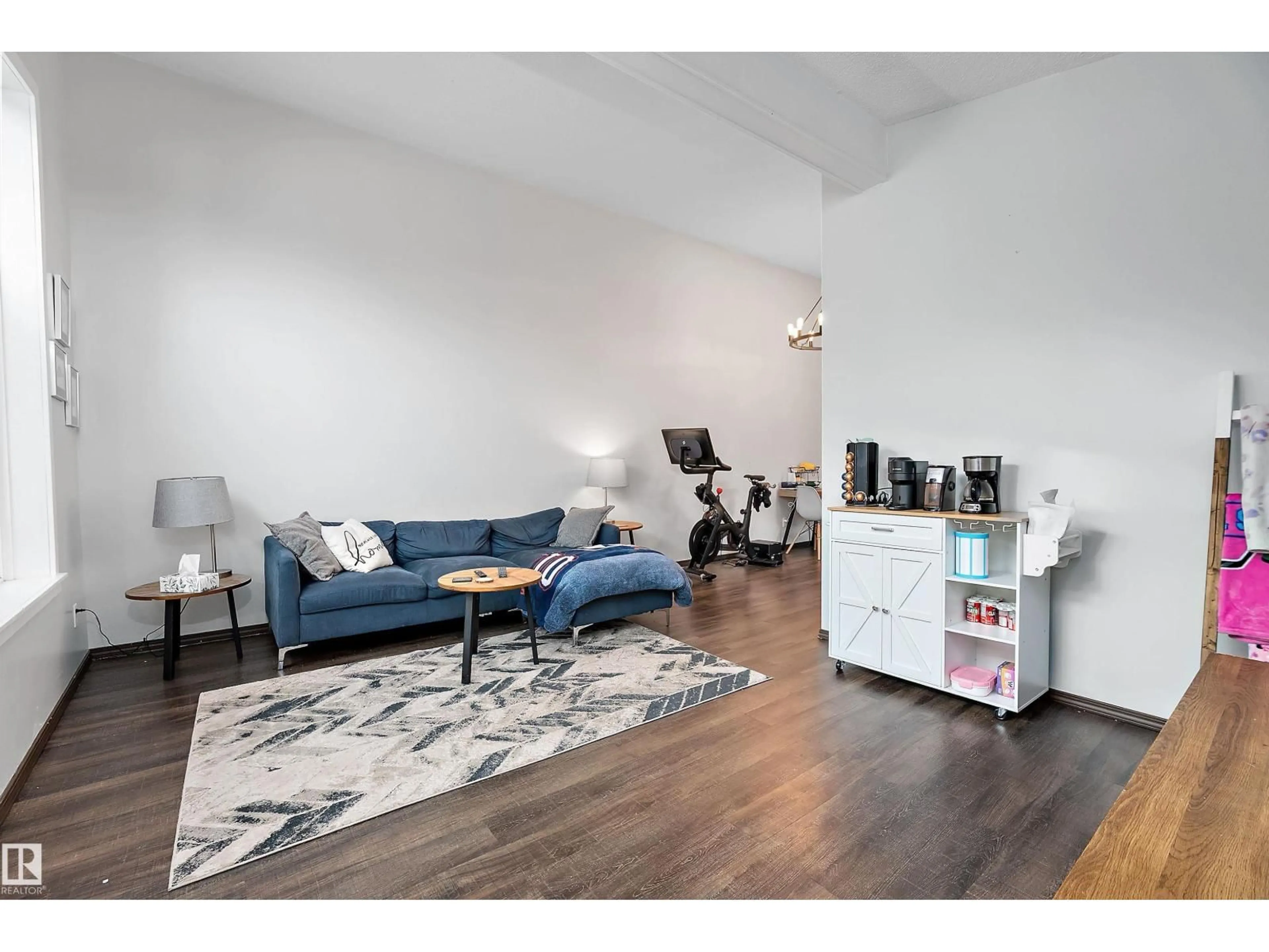 Living room with furniture, unknown for 9714 88 AV, Edmonton Alberta T6E2P9