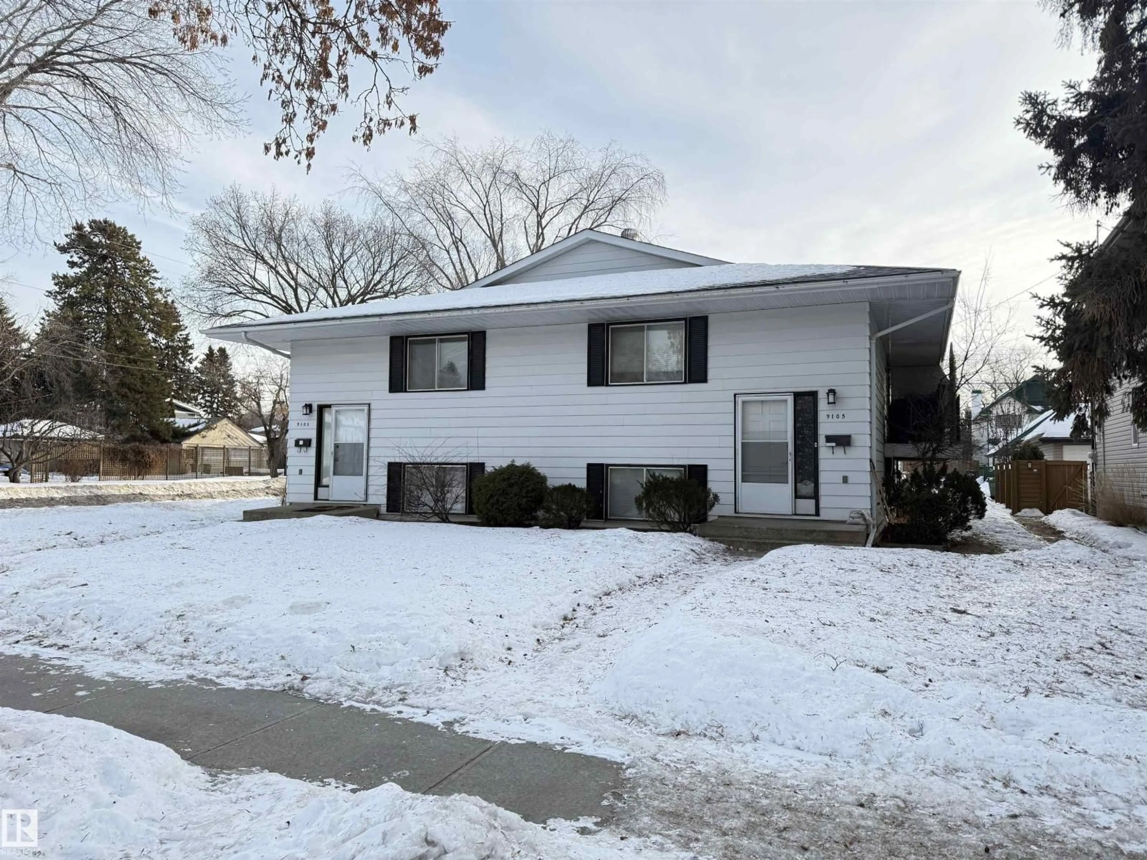 Home with vinyl exterior material, street for 7810 91 ST, Edmonton Alberta T6C4K4