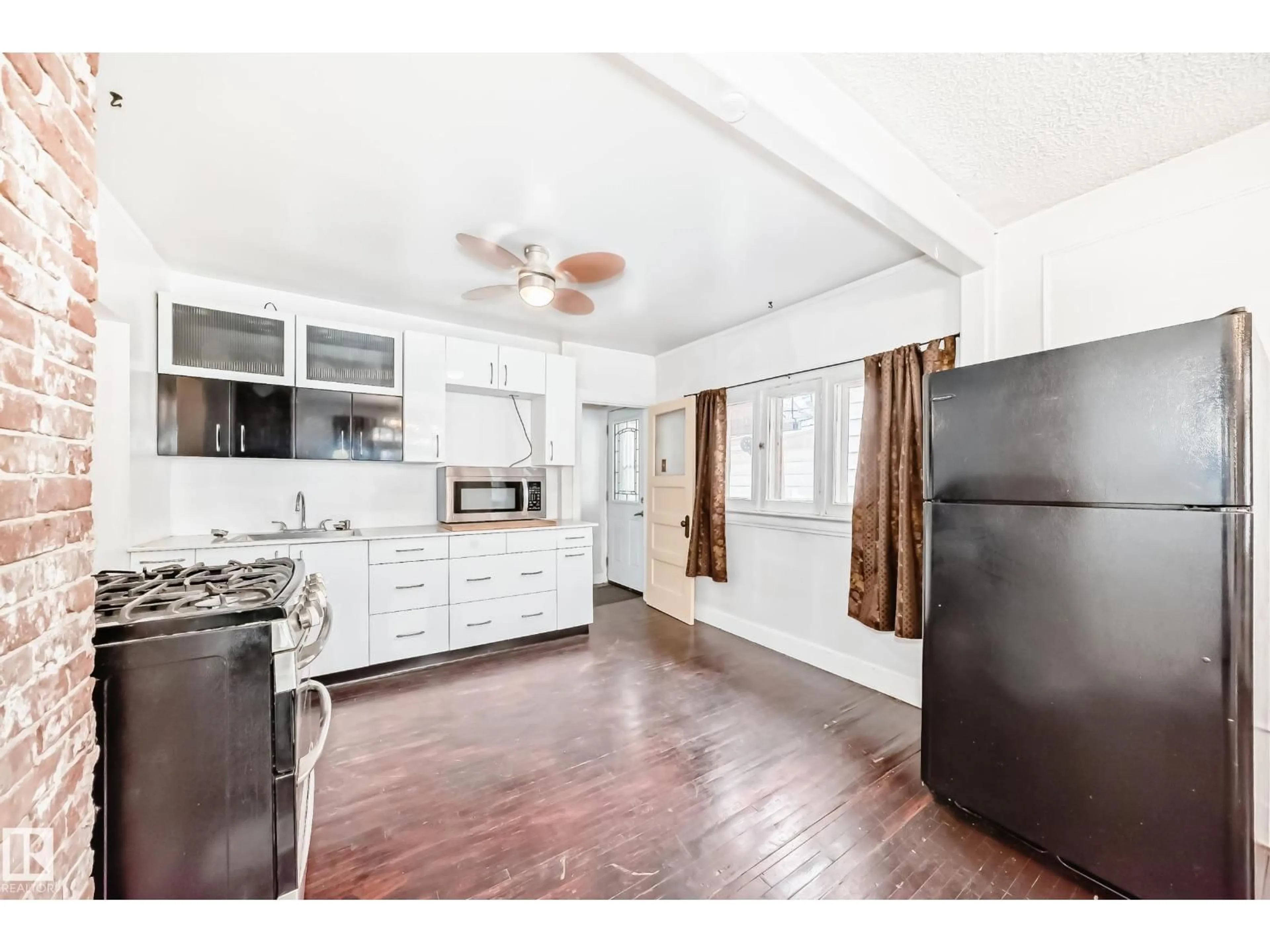 Open concept kitchen, unknown for NW - 11619 96 ST, Edmonton Alberta T5G1T8