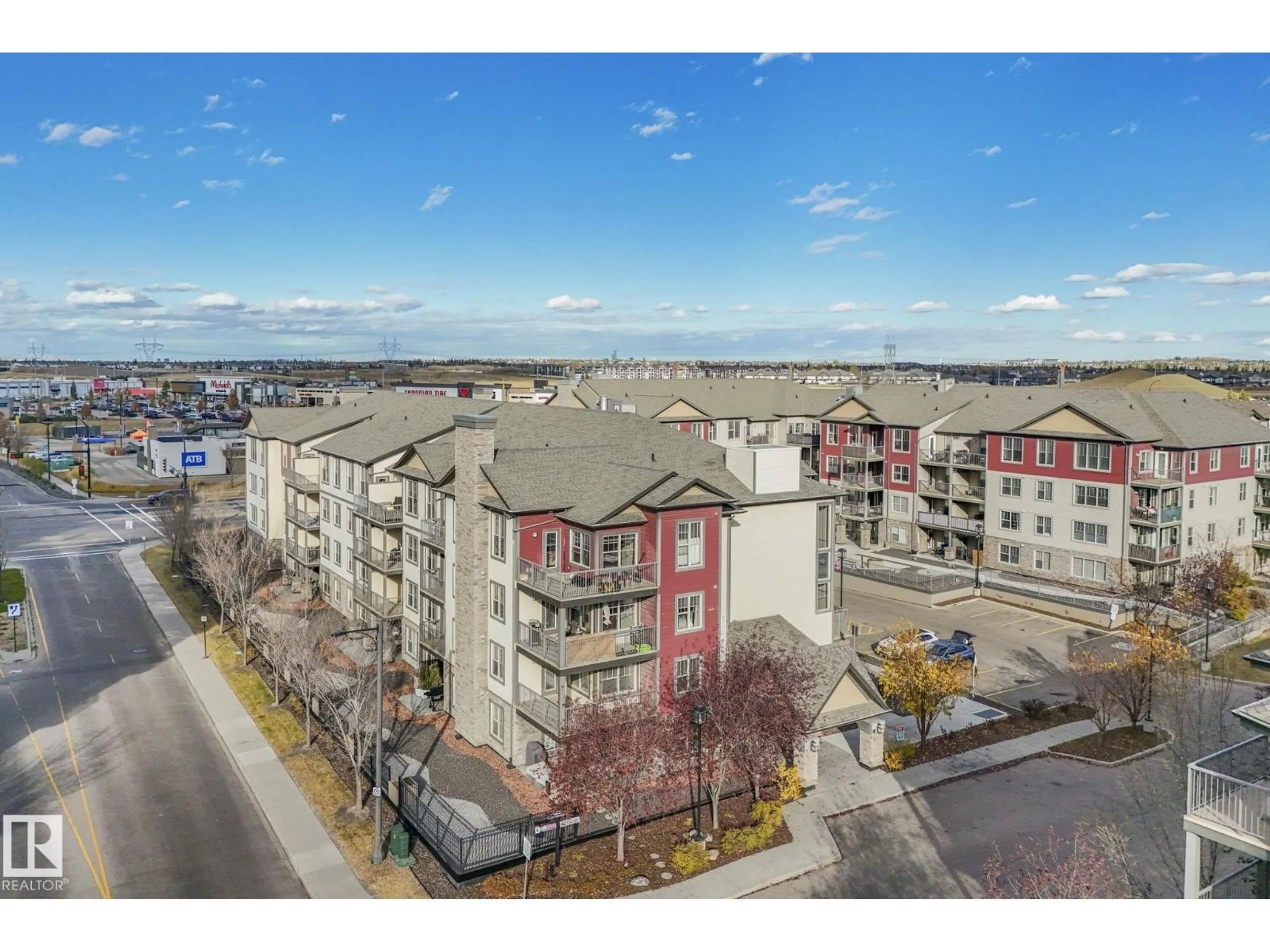 A pic from outside/outdoor area/front of a property/back of a property/a pic from drone, city buildings view from balcony for 103 - 210 AMBLESIDE DR, Edmonton Alberta T6W0J4