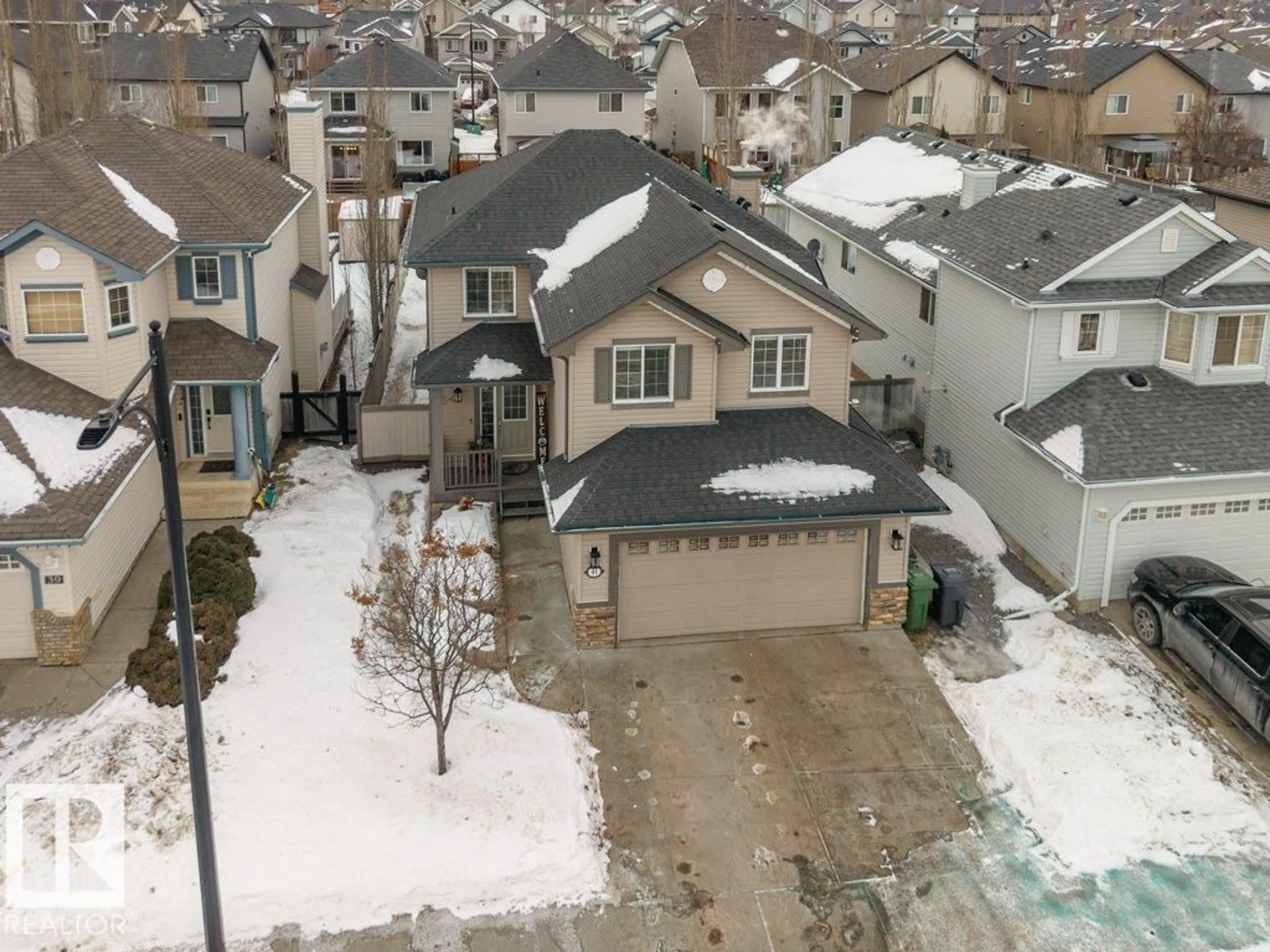 A pic from outside/outdoor area/front of a property/back of a property/a pic from drone, street for 41 POINTE MASSON, Beaumont Alberta T4X1S9