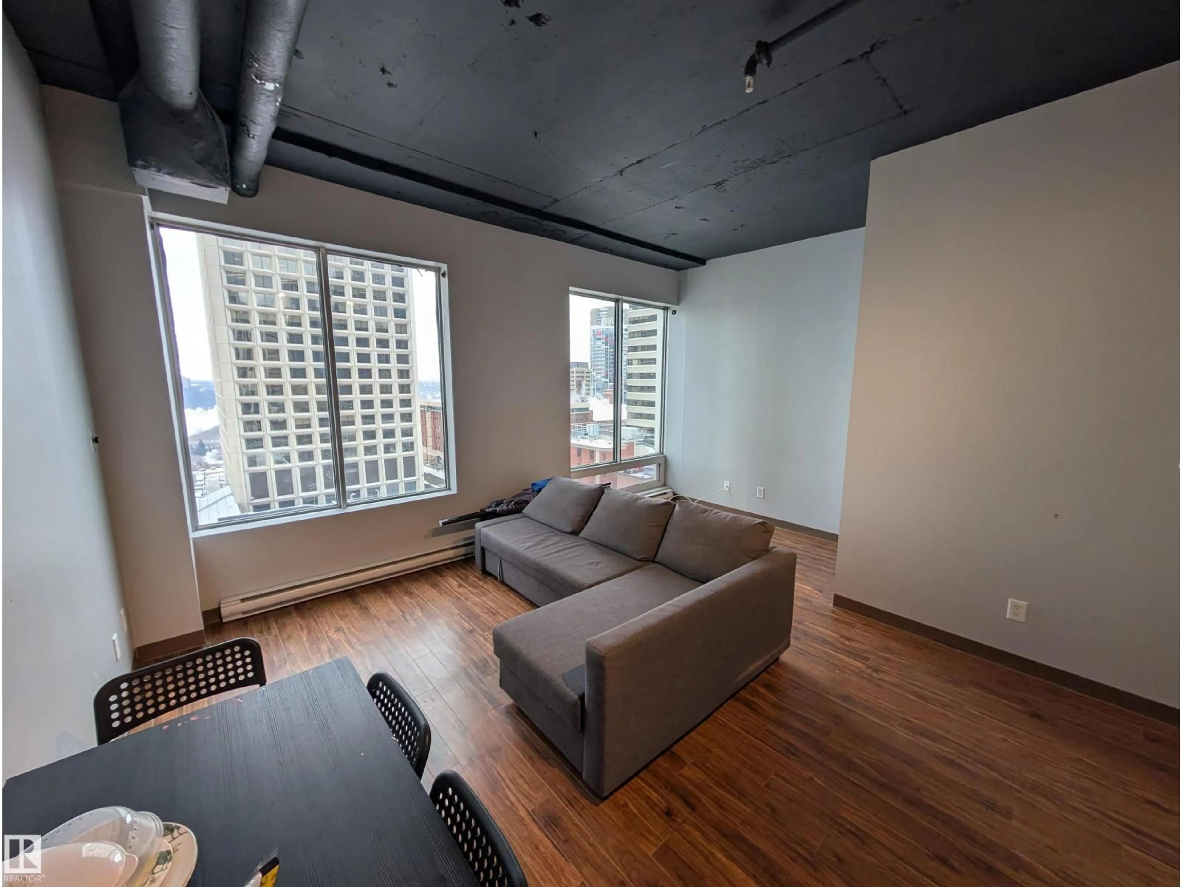 Living room with furniture, unknown for 10024 - 1013 JASPER AV, Edmonton Alberta T5J1R9