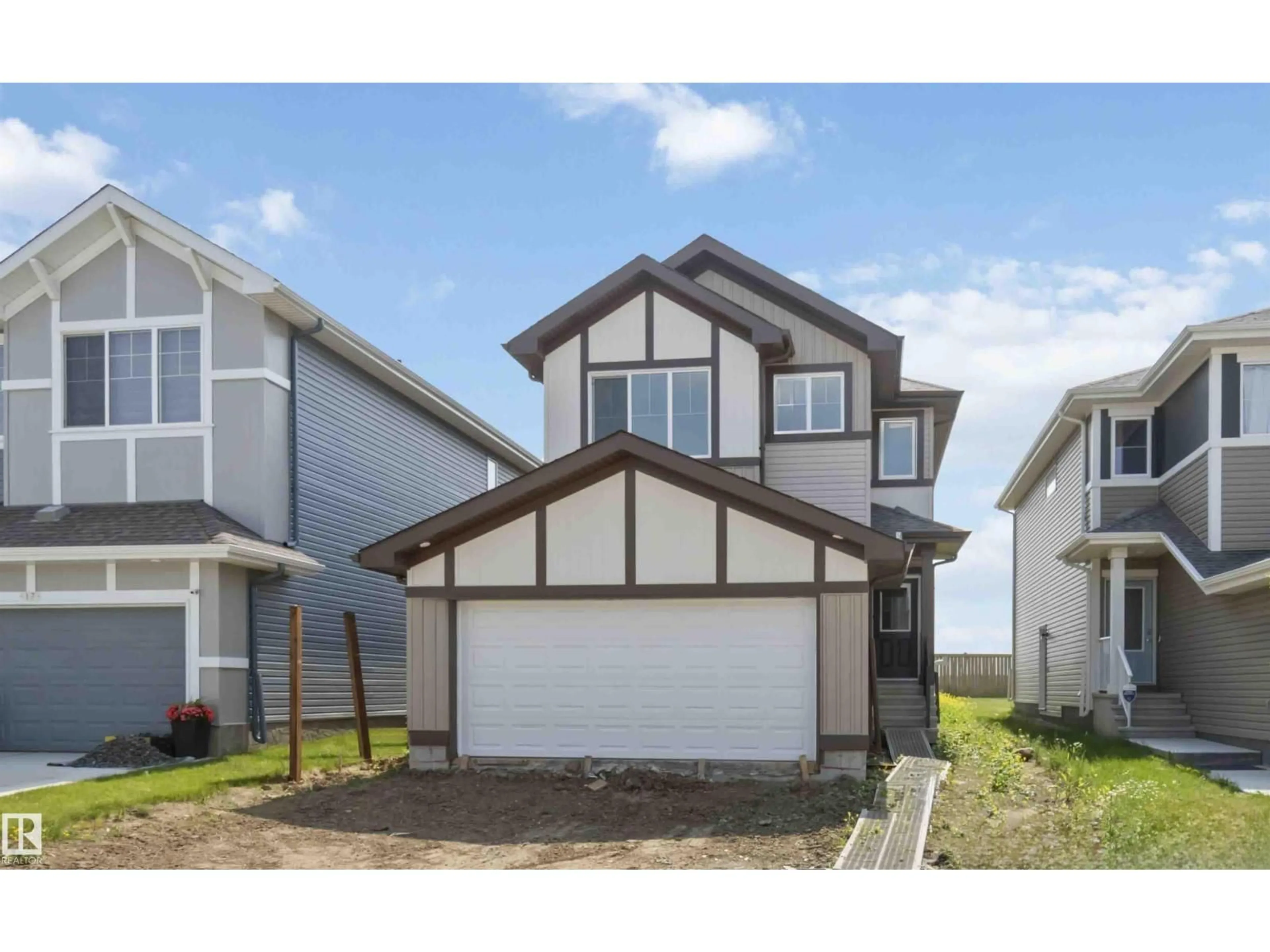 Home with vinyl exterior material, street for 19 SPRINGBROOK WD, Spruce Grove Alberta T7X2W5