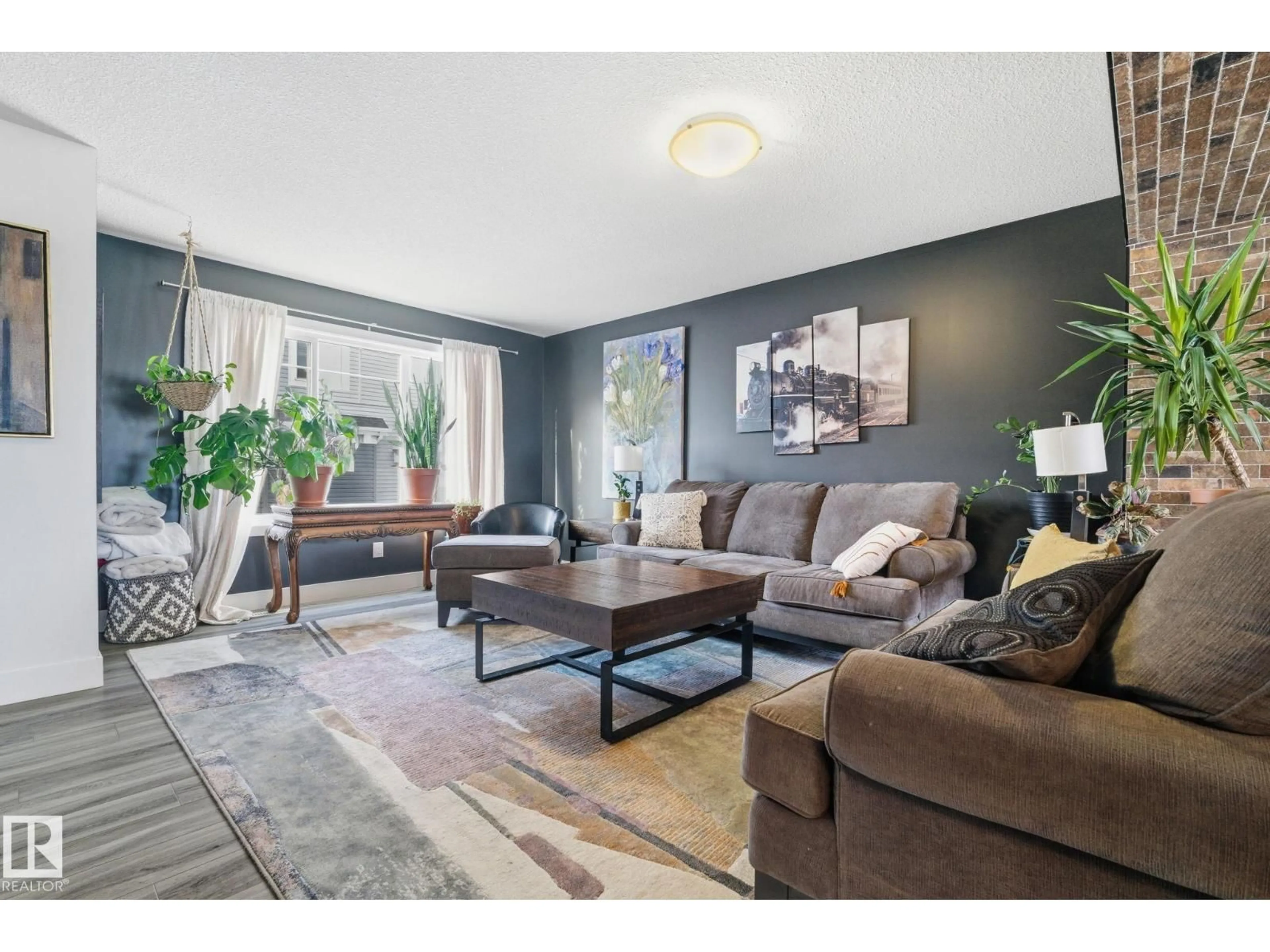 Living room with furniture, unknown for #34 - 1391 STARLING DR, Edmonton Alberta T5S0L3