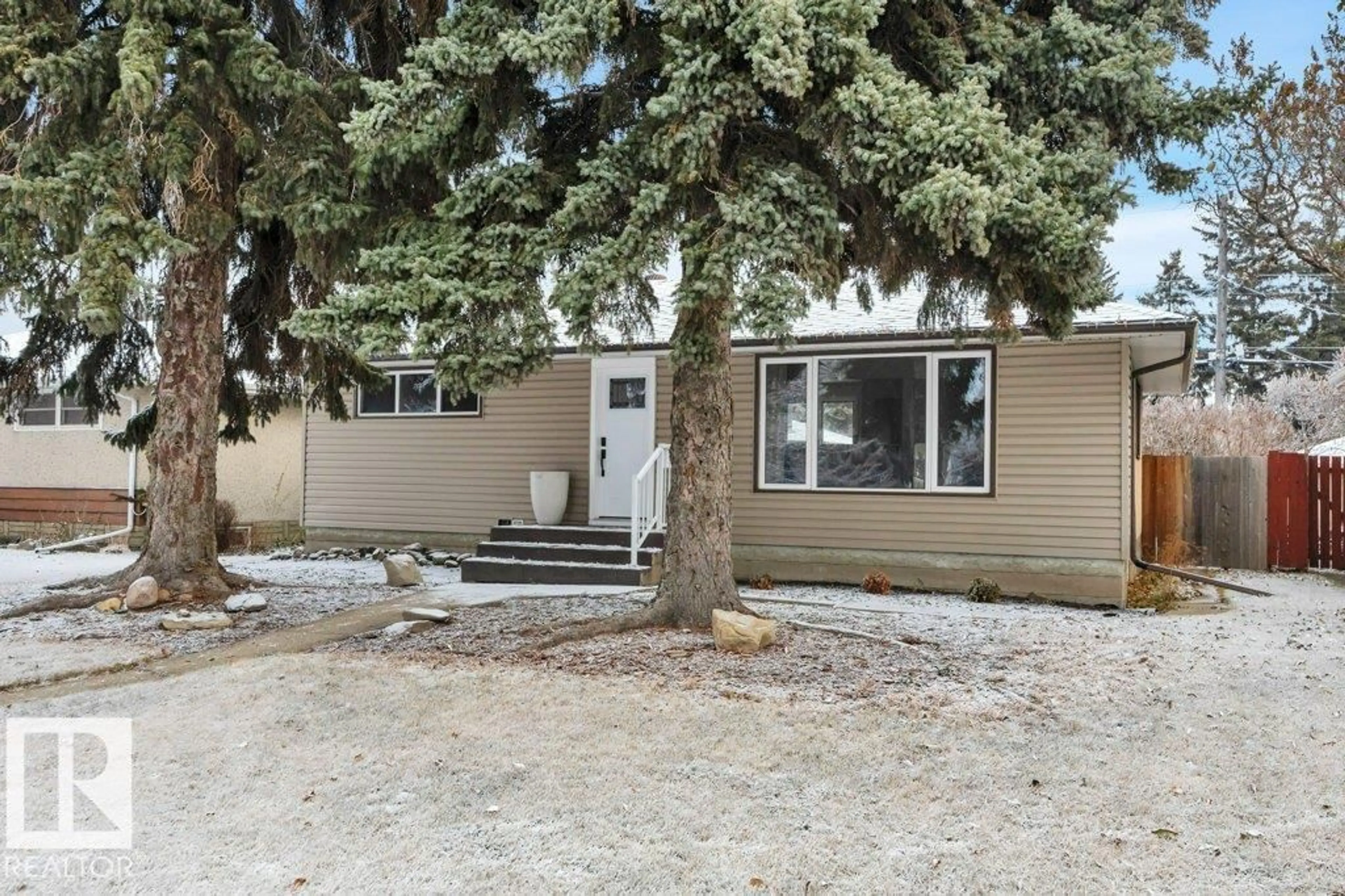 Home with vinyl exterior material, street for NW - 10239 50 ST, Edmonton Alberta T6A2C2