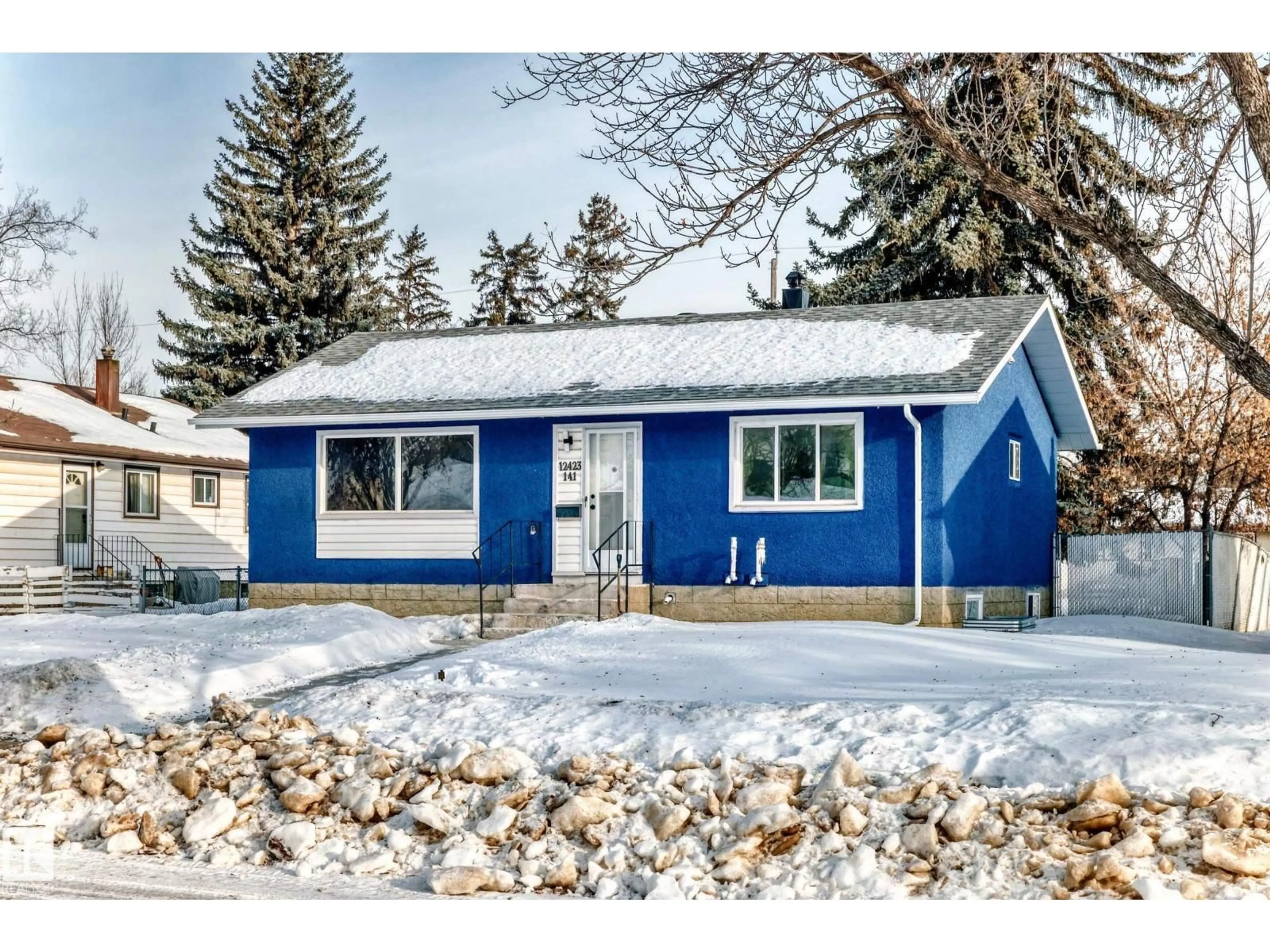 Home with vinyl exterior material, street for NW - 12423 141 ST, Edmonton Alberta T5L2G4