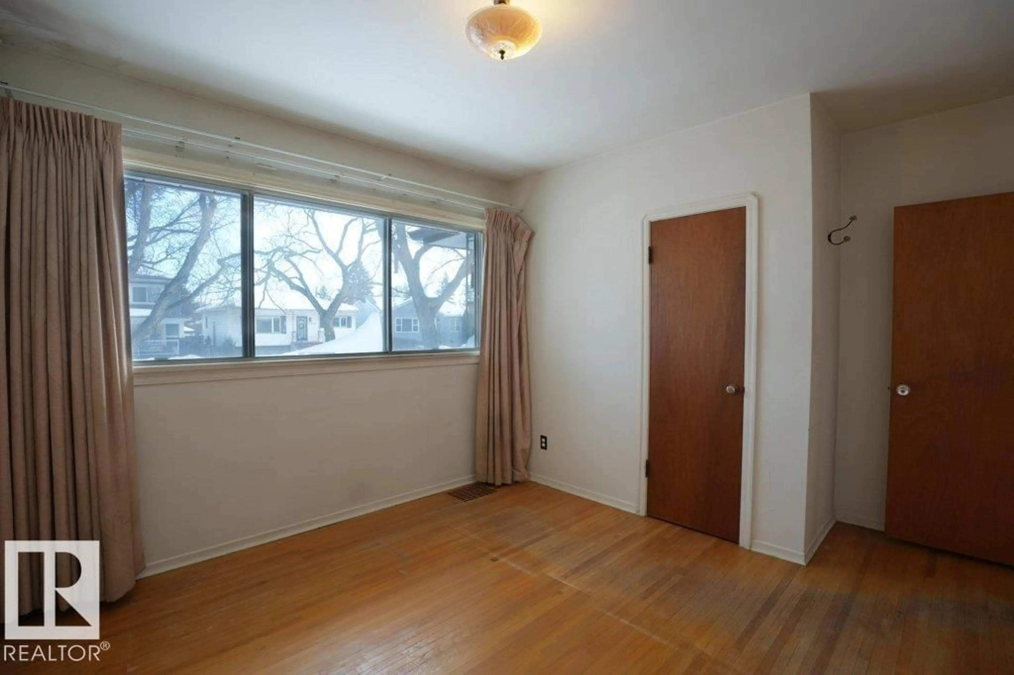 A pic of a room for NW - 11720 135A ST, Edmonton Alberta T5M1L5