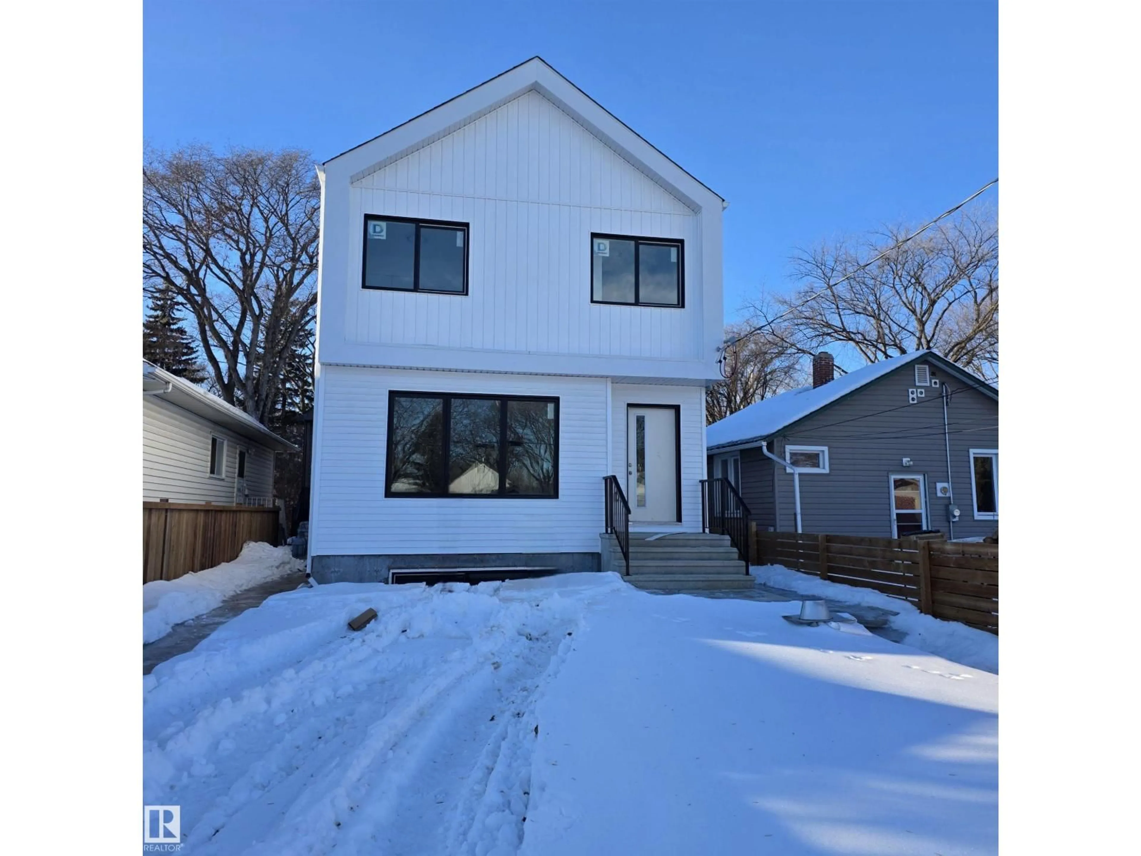 Home with vinyl exterior material, street for 2 - 12921 118 ST, Edmonton Alberta T5E5L1