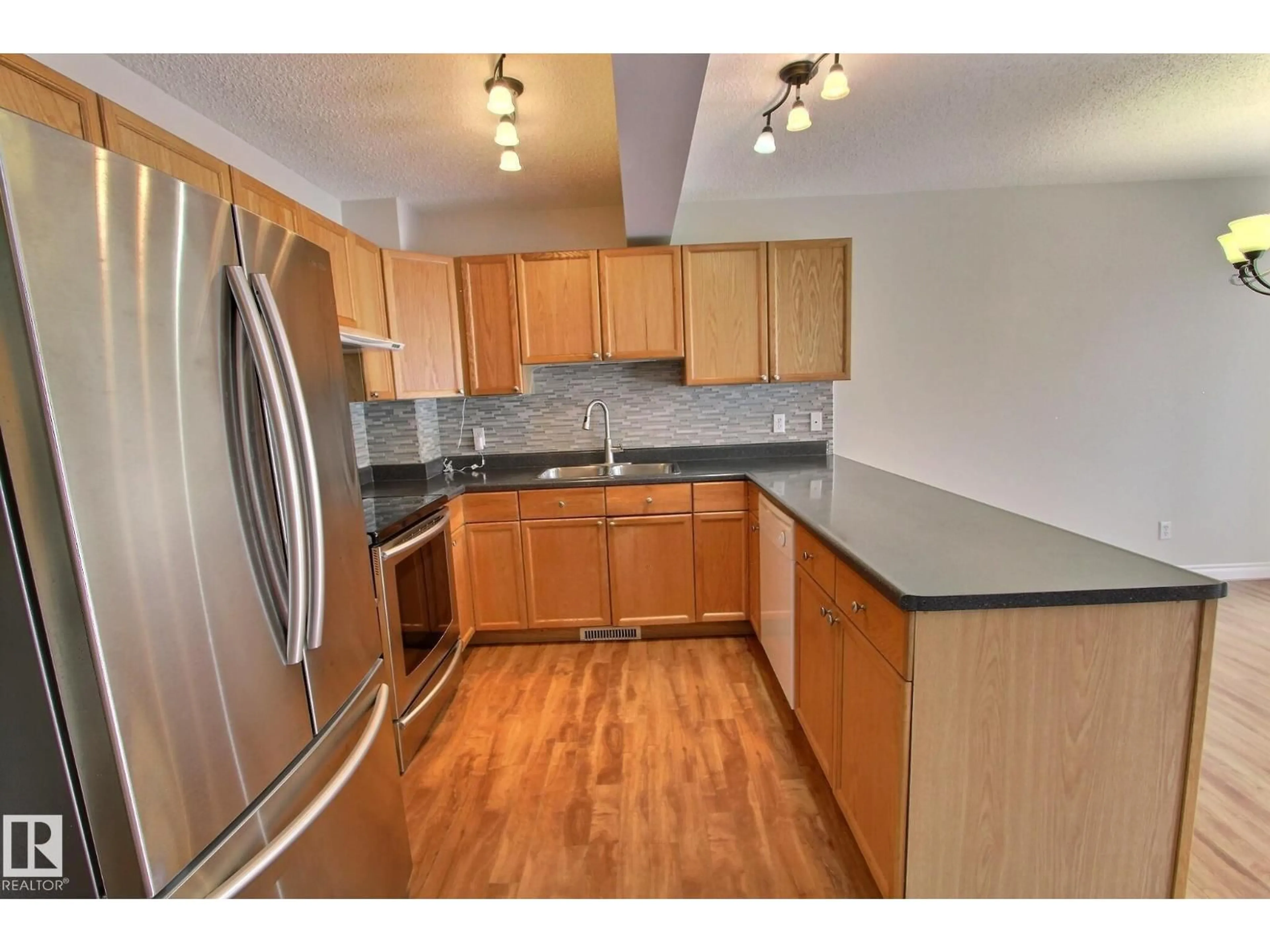 Standard kitchen, wood/laminate floor for NW - 16127 132 ST, Edmonton Alberta T6V1N7