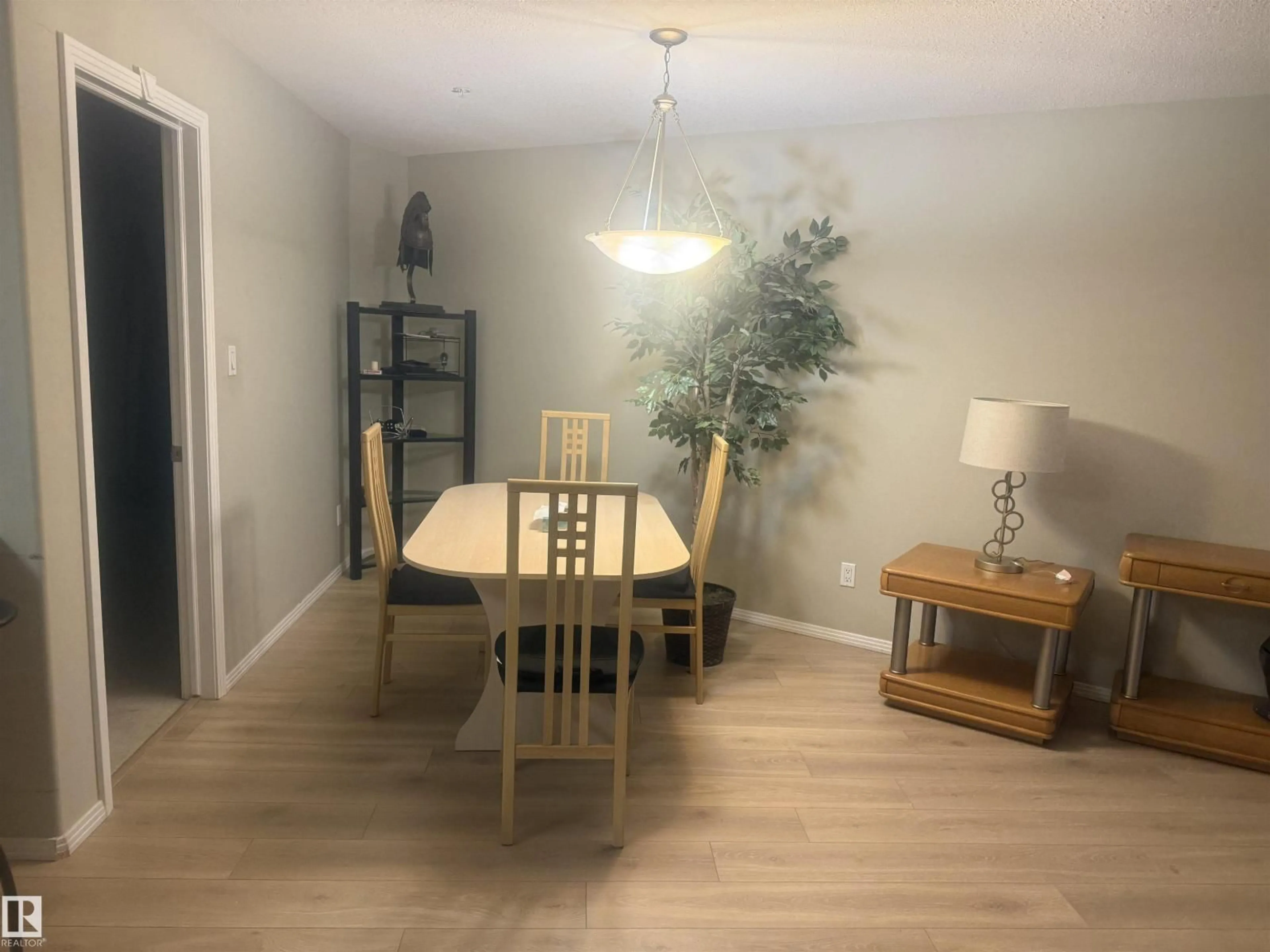 Dining room, wood/laminate floor for 315 592 HOOKE RD NW, Edmonton Alberta T5A5H2