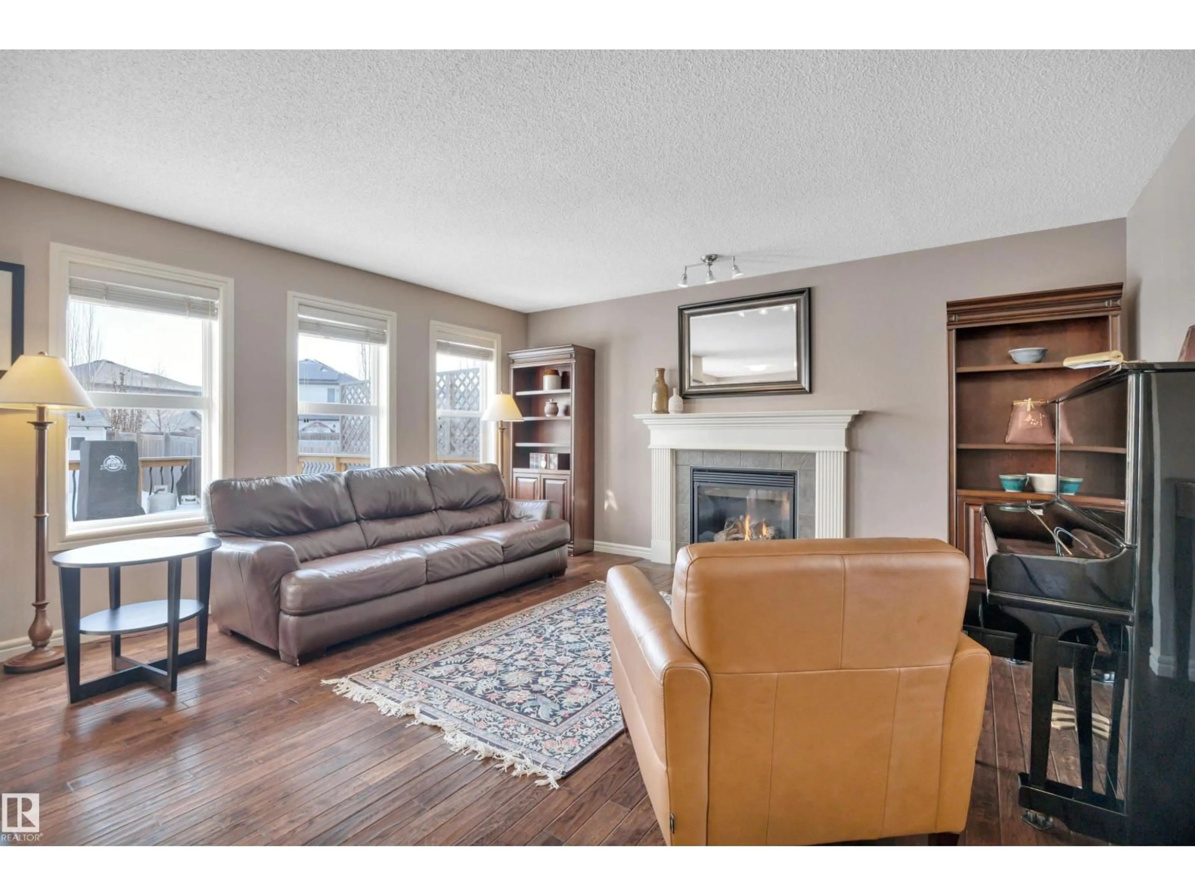 Living room with furniture, wood/laminate floor for 581 FOXBORO LO, Sherwood Park Alberta T8A0P6