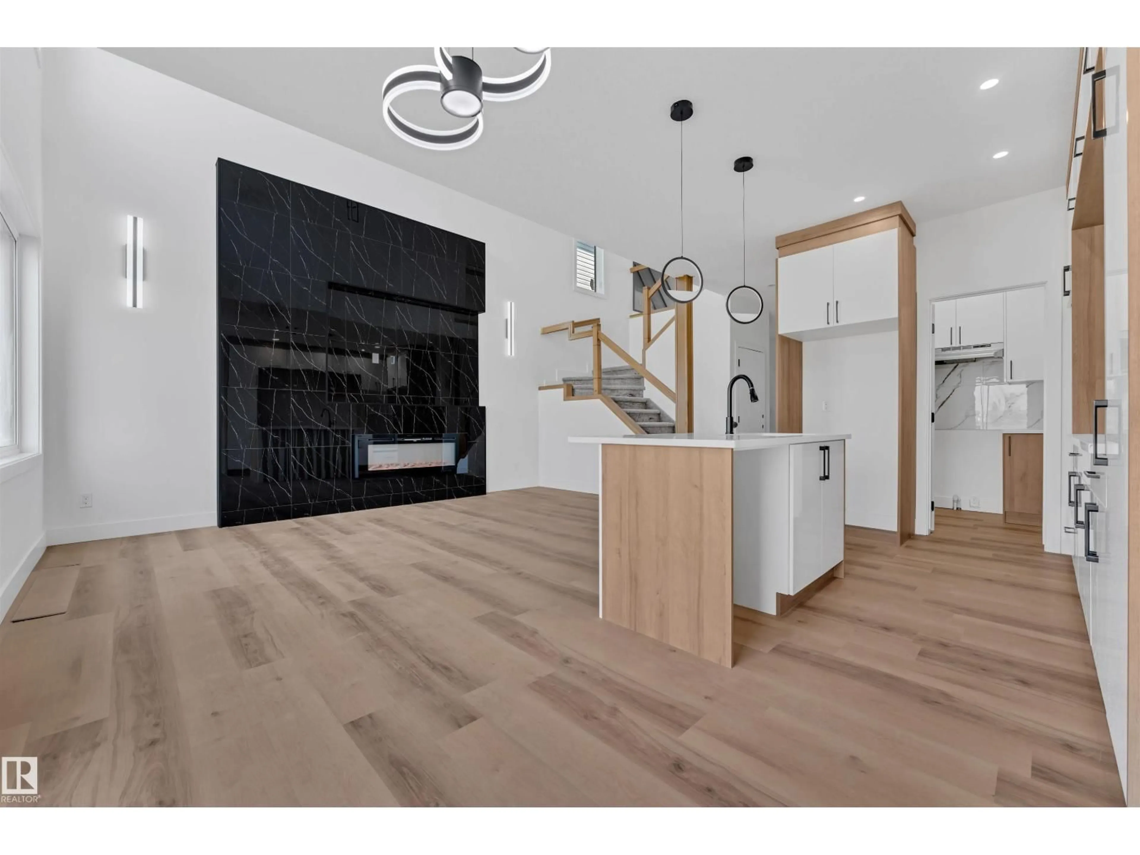 Open concept kitchen, wood/laminate floor for NW - 1914 155 AV, Edmonton Alberta T5Y4H8