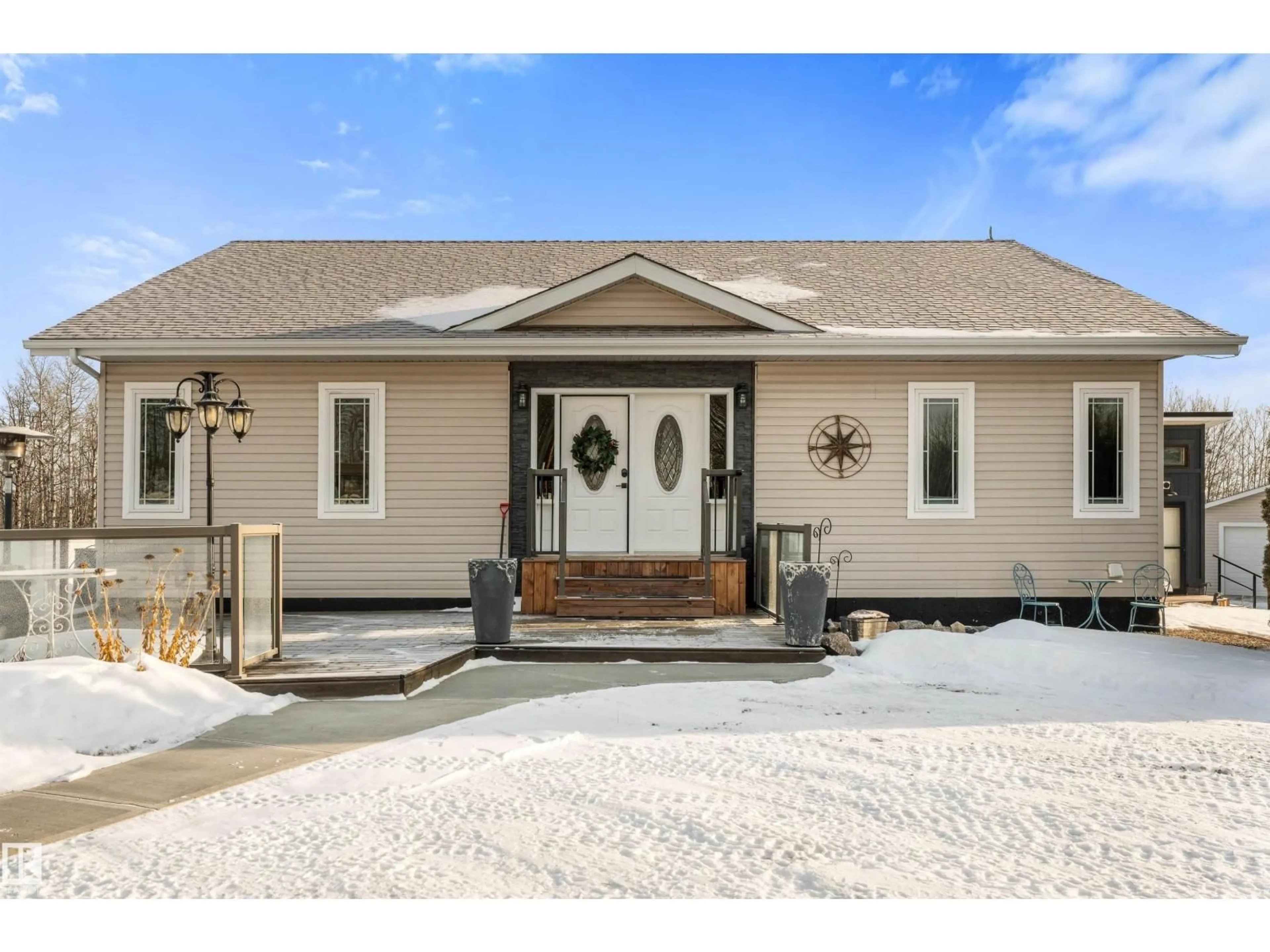 Home with vinyl exterior material, street for 103 - 52318 RGE ROAD 25, Rural Parkland County Alberta T7Y2M3