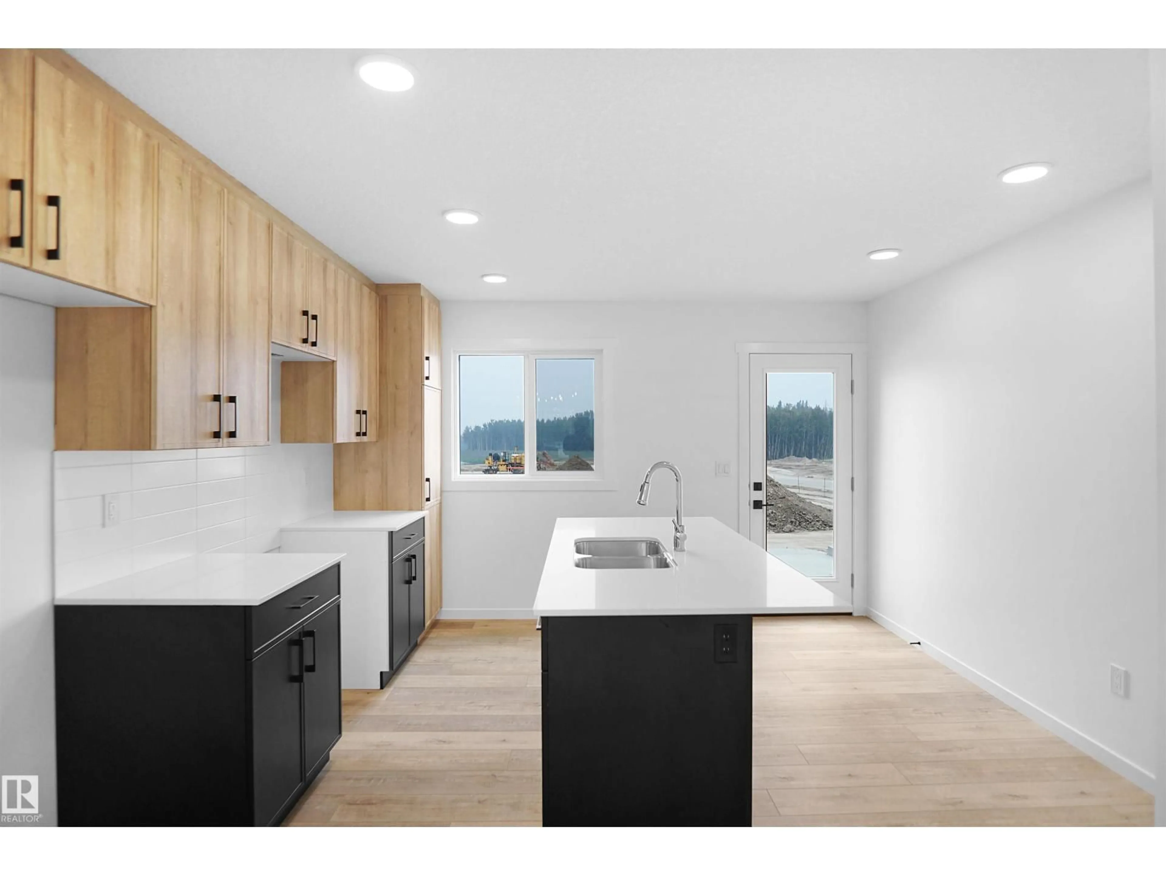 Open concept kitchen, unknown for NW - 2119 210 ST, Edmonton Alberta T5S0T1