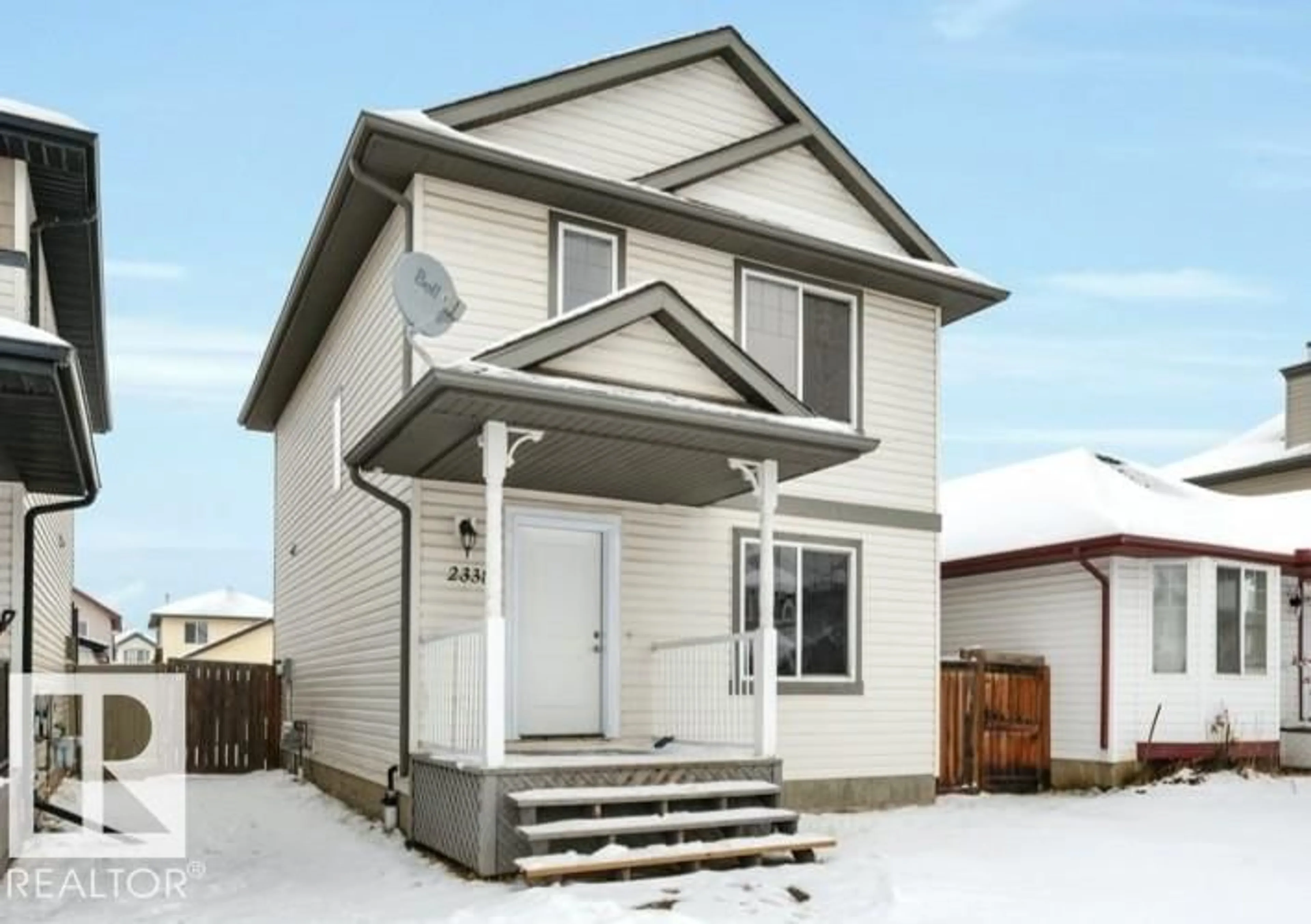 Home with vinyl exterior material, street for 2338 29A AV, Edmonton Alberta T6T2B1