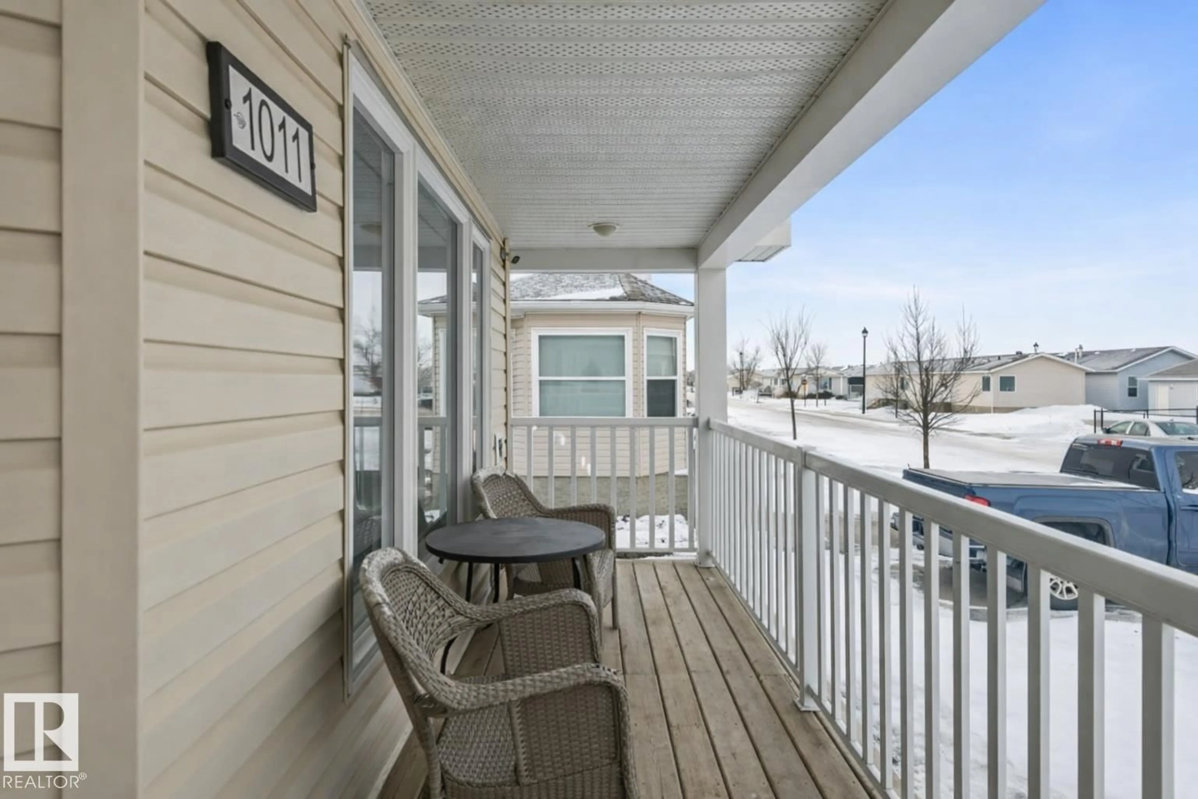 Patio, water/lake/river/ocean view for E - 1011 ASPEN DR, Leduc Alberta T9E8R5